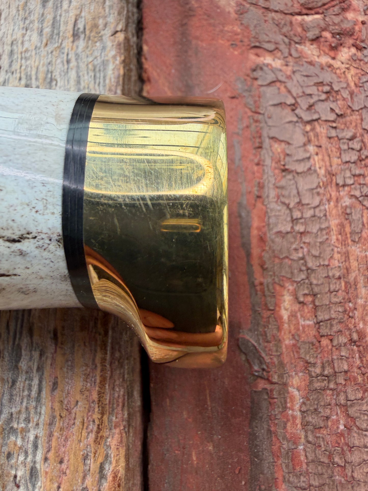 New in paper fresh from the Shop. Randall Knife Model 14-7.5 Big. Nice piece of Stag, Gorgeous Brass Lugged hilt and brass crows beak butt cap. Single black spacer. Stainless steel.