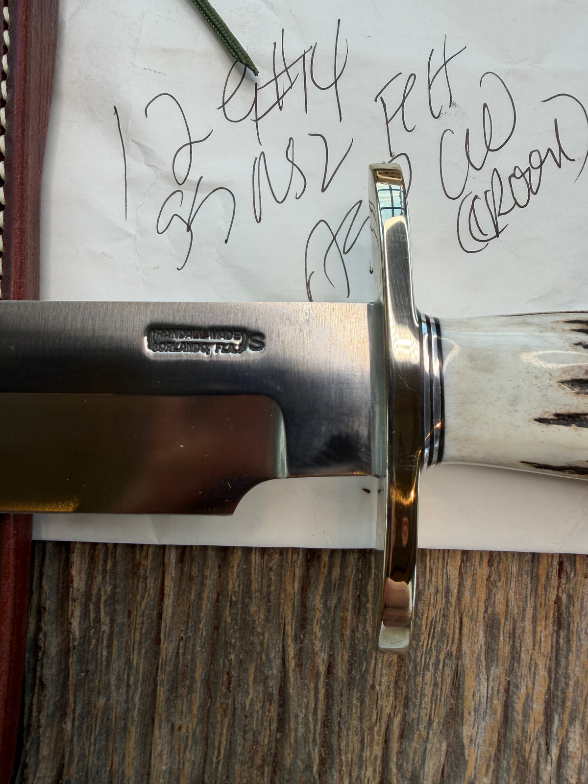 New in Paper Randall Model 12-9/14 Grind with a really nice piece of Crown stag. SS, Nickel Silver Hilt black and Aluminum  spacers.