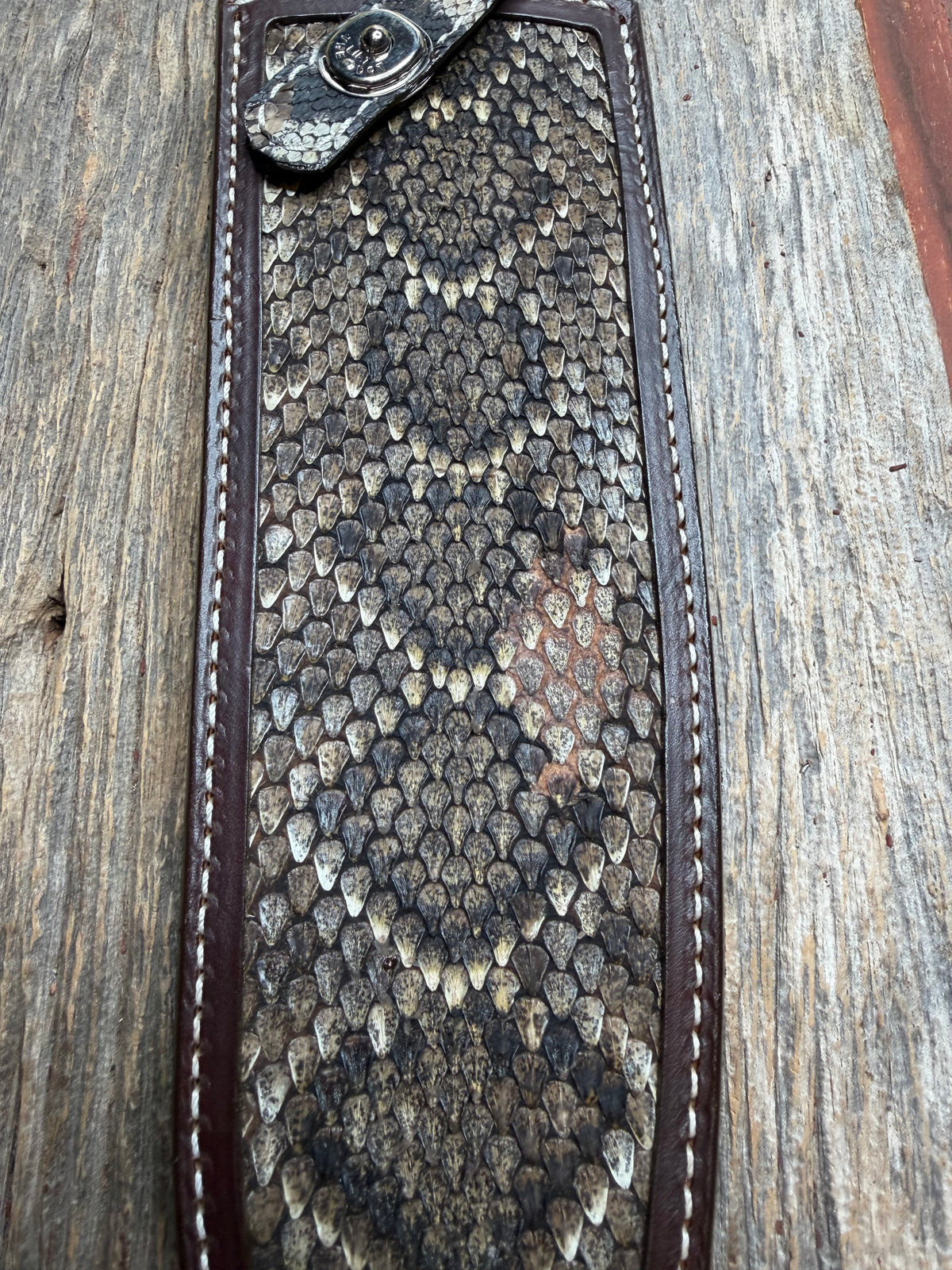 Randall Model Large Sasquatch sheath with a Western Diamondback RattleSnake skin from Treeman Sheaths. Very dark skin and quite honestly the nicest one I’ve had in WDB.