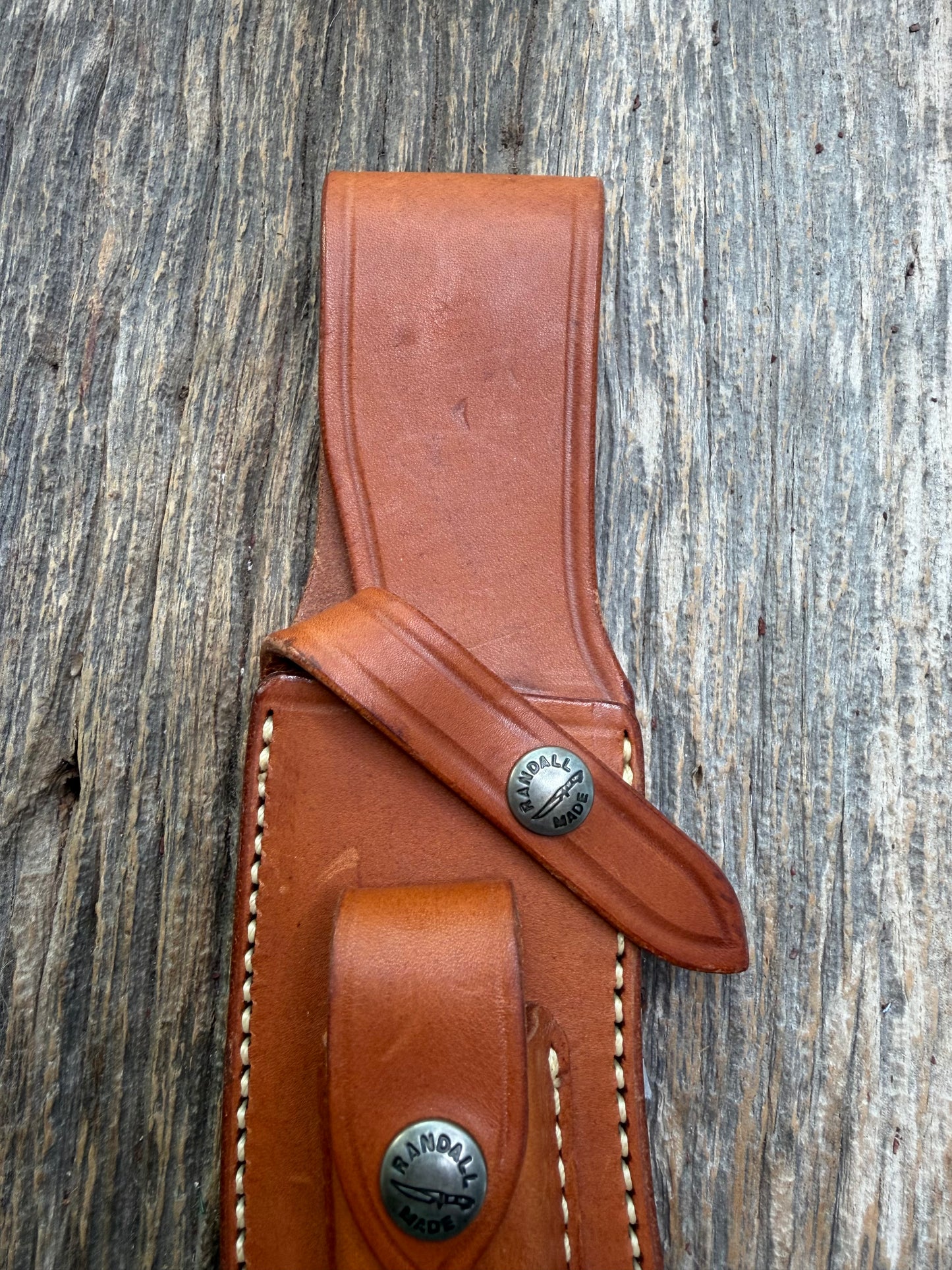 Randall by Gutcher Knife Sheath for a Model Rick Bowles Special.  Randall snaps, pouch with stone. Tuff sheath.