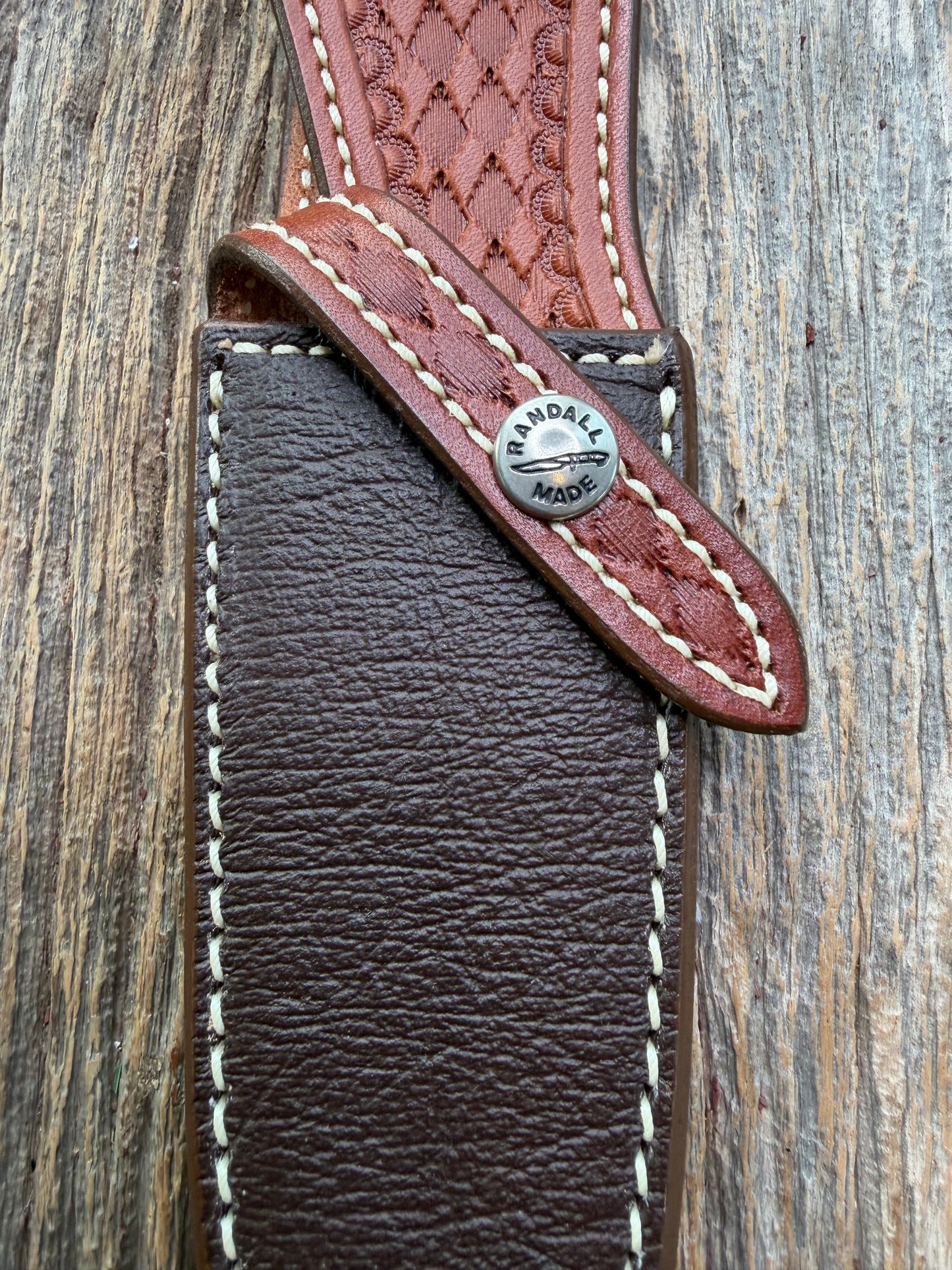Pristine Randall Model 25-5 sheath in Exotic Cape Buffalo leather from Sullivans by Gutcher. Heavily tooled belt loop and strap. Randall snap and clean stamping on the back … perfect!!