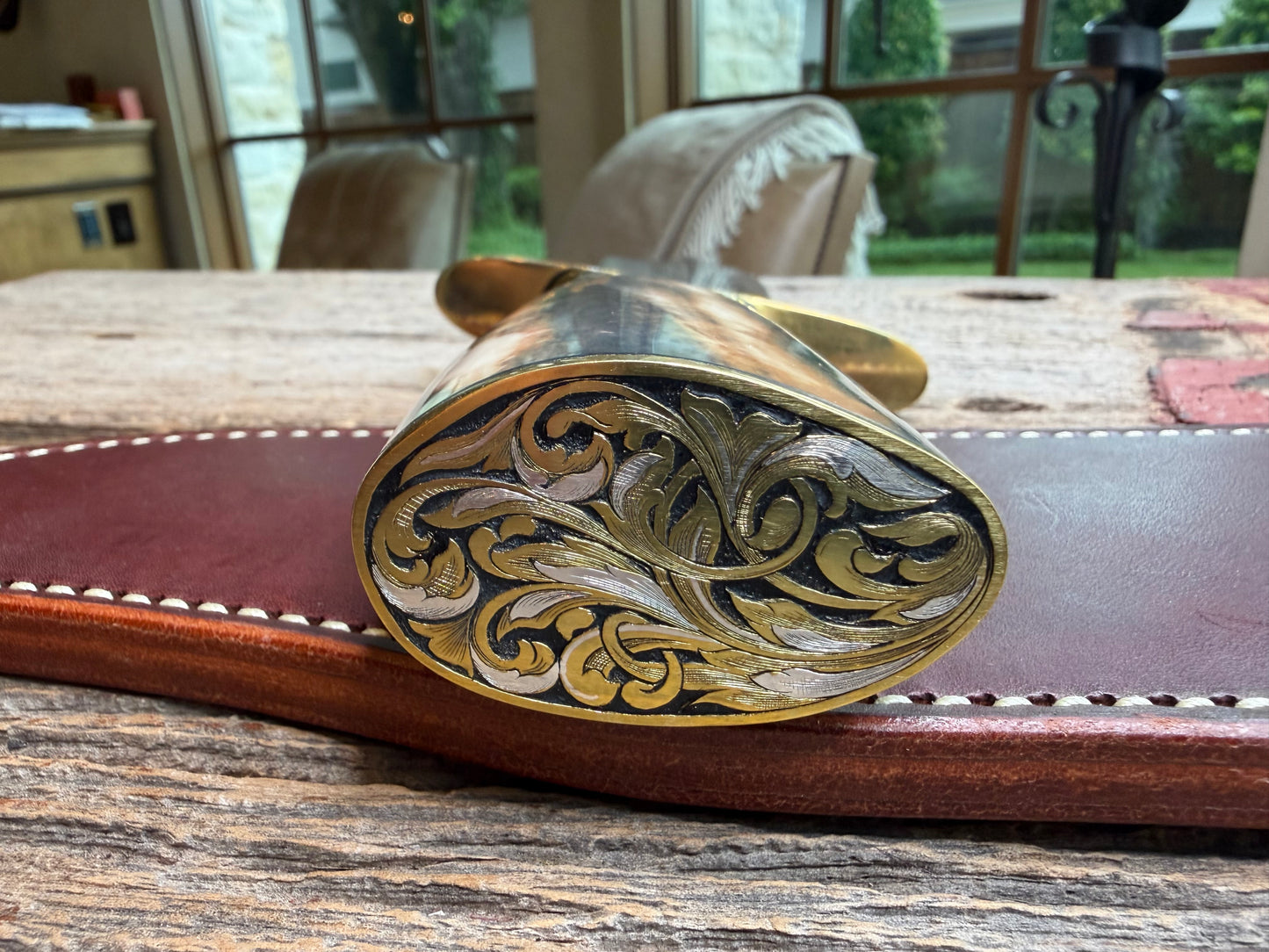 Randall Model 12-11 Smithsonian “Smitty” in a Huge piece of Green, Brown and Blue Fossil Walrus Ivory. Brass Hilt and Brass Butt plate fully engraved in Silver from Jere Davidson.  Stunning piece.