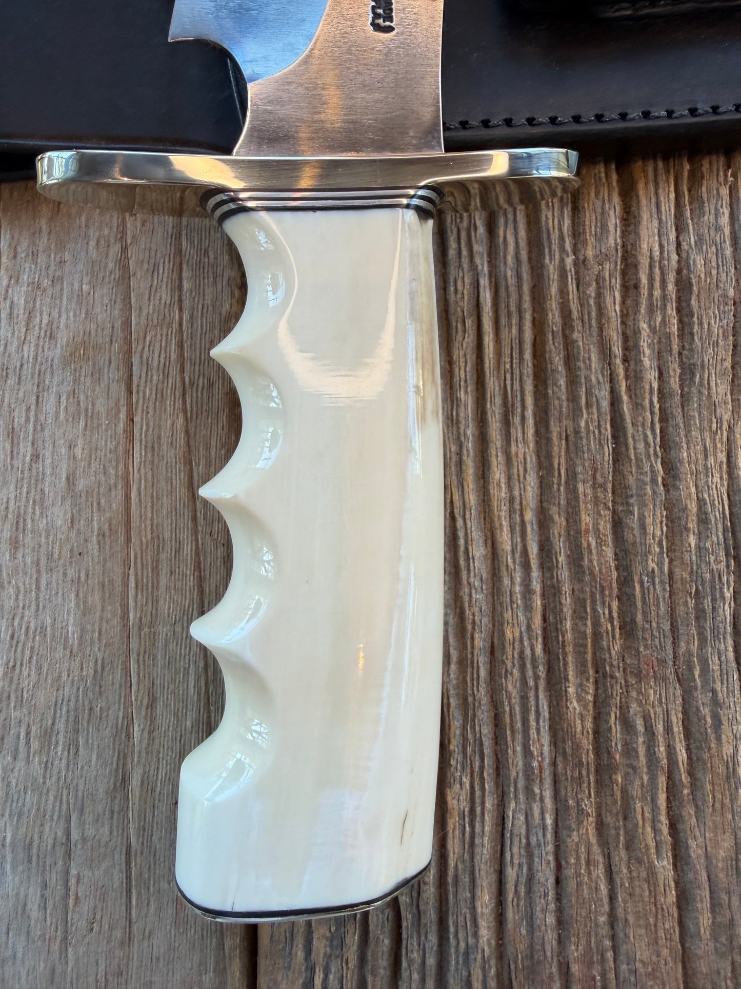 New in Paper Randall Model 12-11 Dealer Special Large Sasquatch Huge piece of Pearly White Fossil walrus Ivory, Finger Groves , # 1134 Nickel Silver Hilt and butt cap.