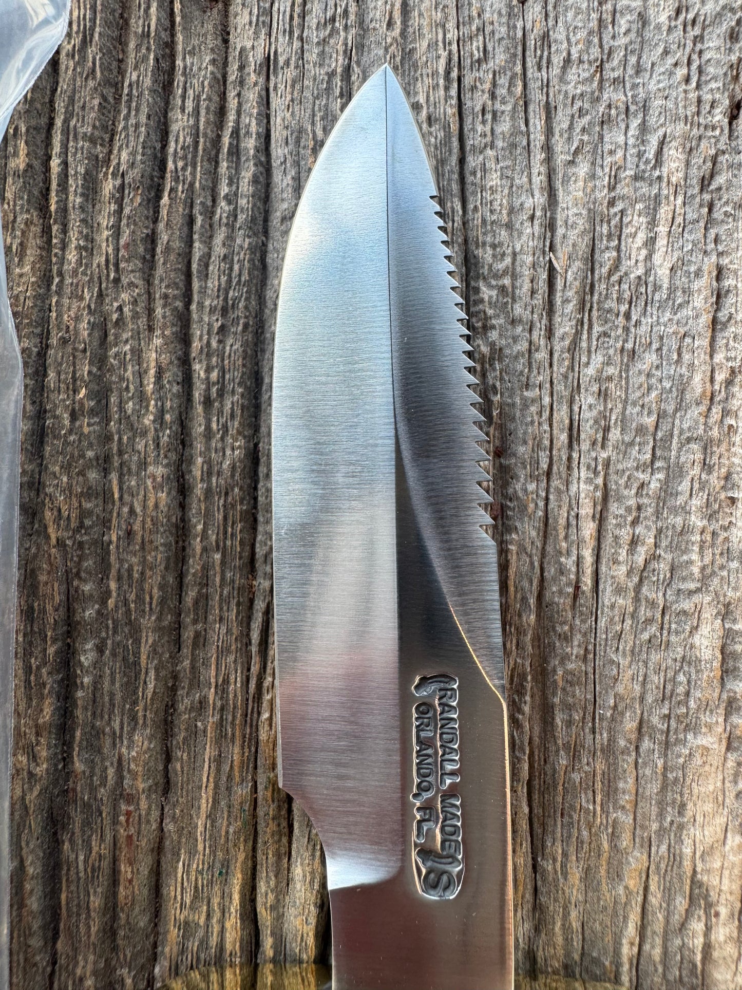 New in paper Randall Model Combat Companion with a nice piece of customer supplied Warthers Resin with finger grooves. Teeth, Stainless Steel, Brass Hilt and brass butt cap.