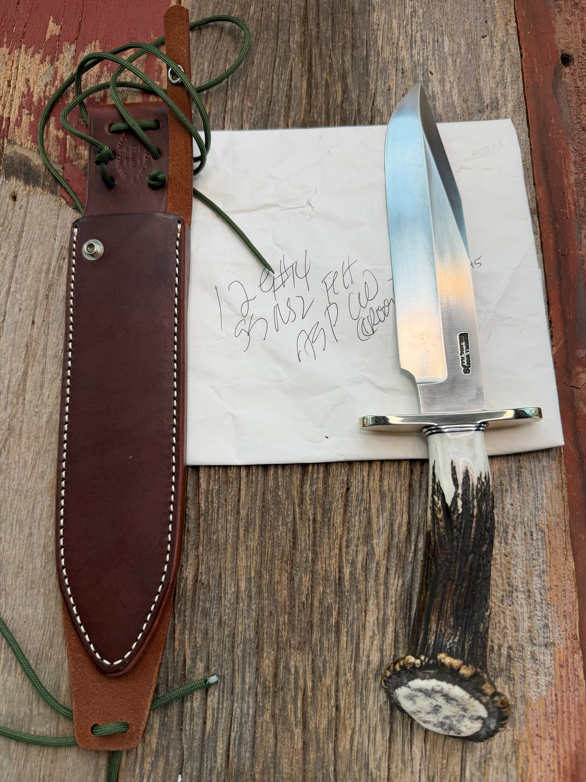 New in Paper Randall Model 12-9/14 Grind with a really nice piece of Crown stag. SS, Nickel Silver Hilt black and Aluminum  spacers.