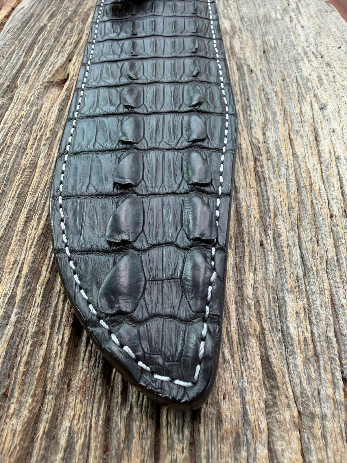 New Randall Model 12-9 Sheath in Exotic Black Matte Crocodile tail from Treeman with a Black Canteen snap. White thread deviated stitching on black leather..Killer sheath.