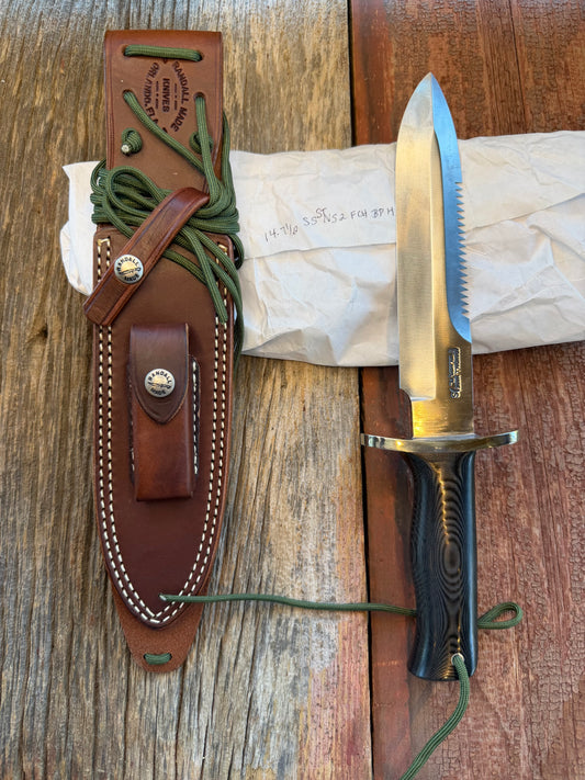 New in Paper Randall Model 14-7.5 in Black Micarta handle, Nickel Silver Hilt, Stainless steel, Sawteeth and Lanyard.