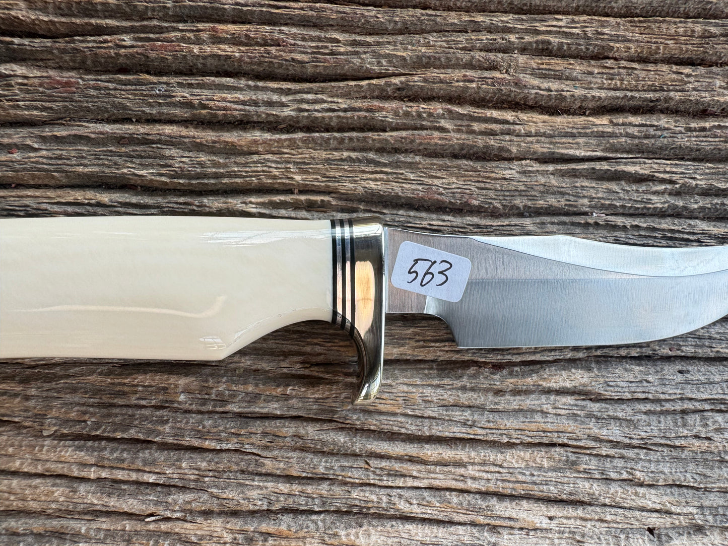 New in paper Randall Model 8-4 with a nice piece of customer supplied Dave Warthers Resin with a single finger grip. Stainless Steel, Nickel Silver Single Hilt and a raw natural end.