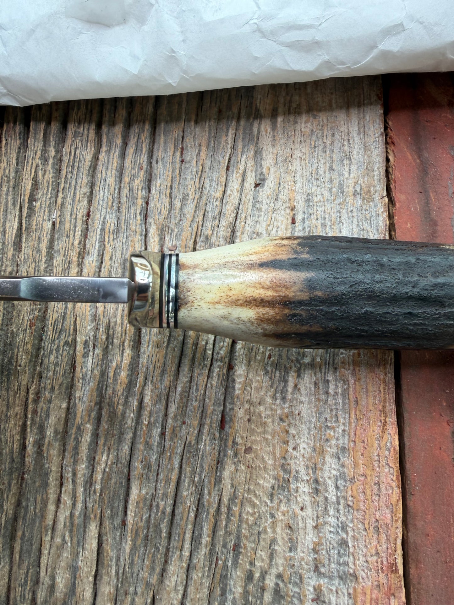 New in Paper Randall Made Knife Model 1-7 Darkened Stag , Stainless, Black and Aluminum spacers, Nickel Silver Hilt, Aluminum butt cap.