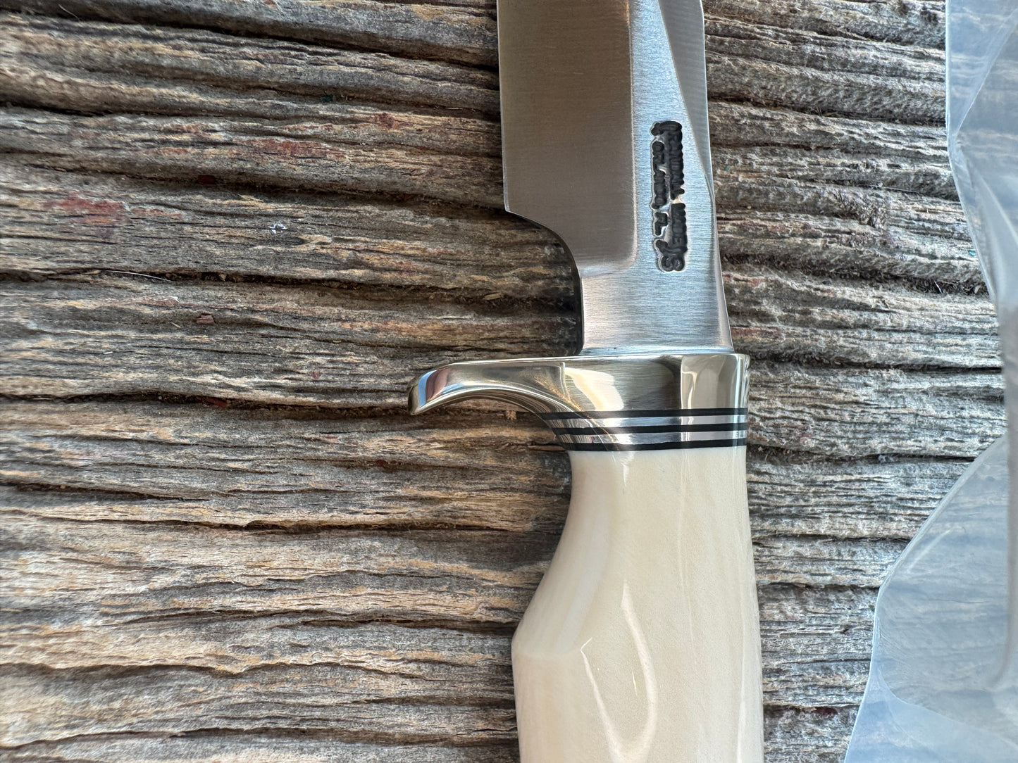 New in paper Randall Model 8-4 with a nice piece of customer supplied Dave Warthers Resin with a single finger grip. Stainless Steel, Nickel Silver Single Hilt and a raw natural end.
