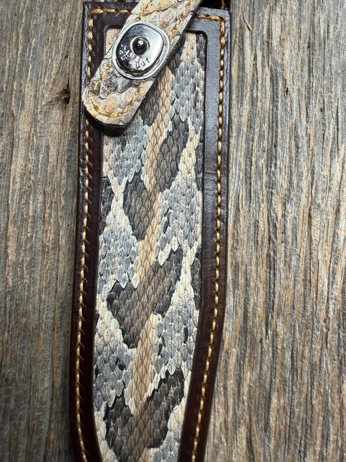 Randall Model 1-8 sheath with a Canebrake RattleSnake skin from Treeman Sheaths. Vibrant colors and along side Copperheads the hardest skin to source.