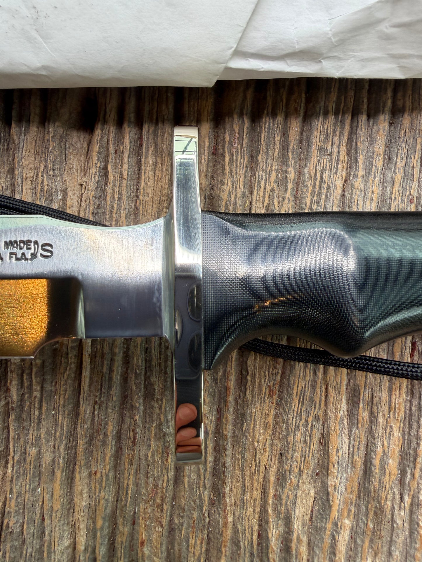 New in Paper Randall Model 16 SP#1 Special fighter with a Black Micarta handle. SS blade, Nickel silver Double hilt. Lanyard. Brown leather sheath.