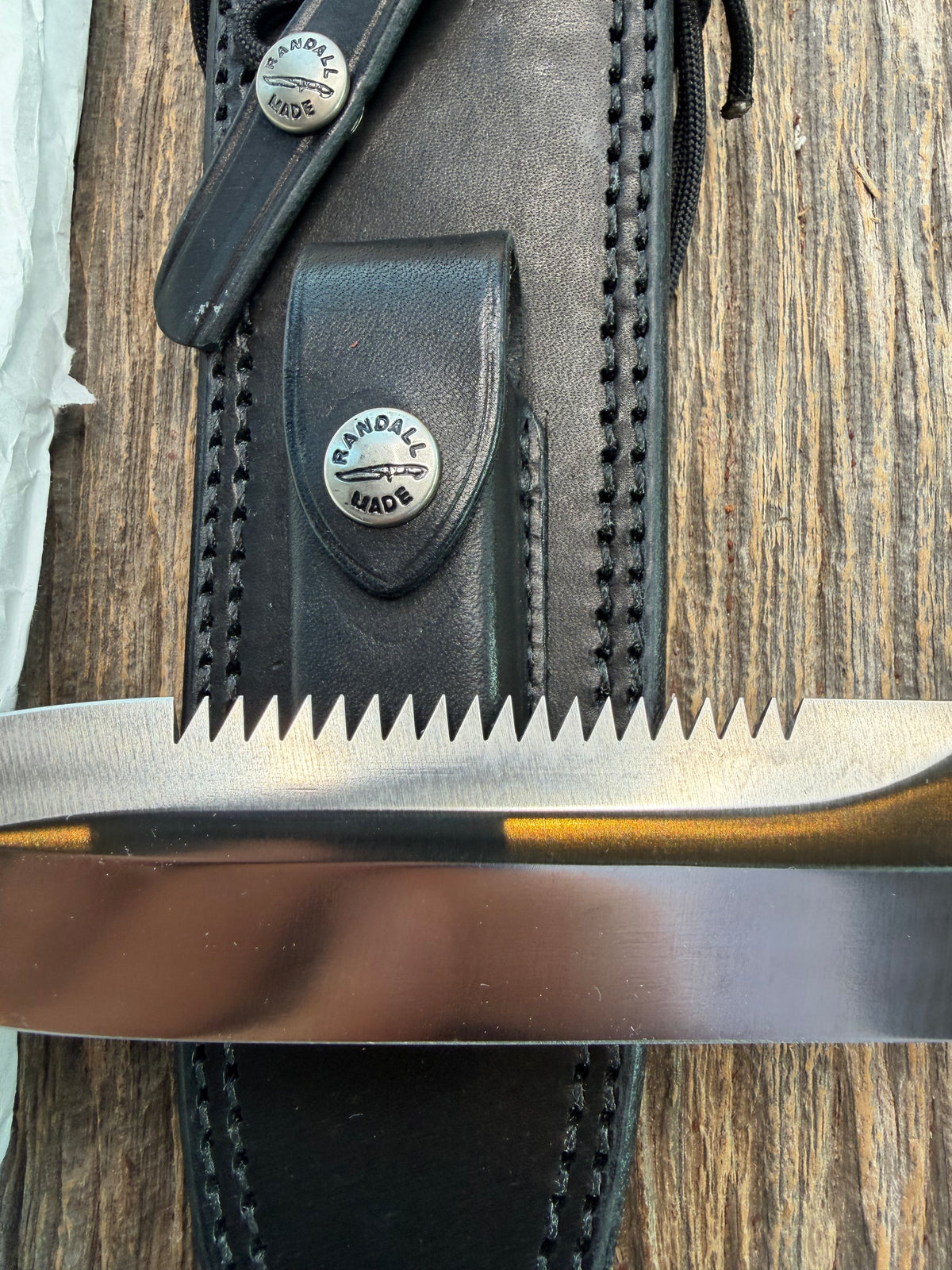 New in Paper Randall Model 14-7.5 with an Orange G10 Micarta Handle. Single Finger grip, SS, Black Sheath, Lanyard and Sawteeth.