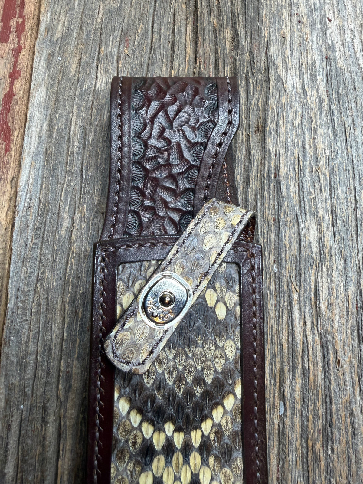 Randall Model 12-9 sheath with an Eastern Diamondback RattleSnake skin from Treeman Sheaths. Hand tooled belt loop, canteen snap. Vibrant colors and one of the hardest skins to source.