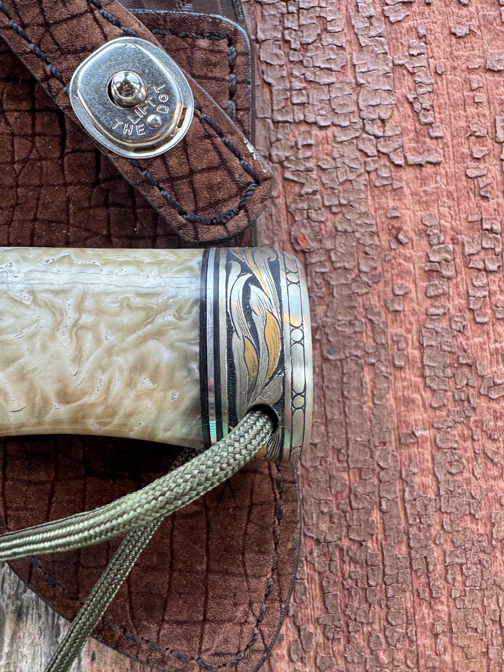 Randall Model Bowles Skinner Dealer Special Knife, perfect Musk Ox. This knife is a one of 4 per Rick Bowles. Beautifully engraved by Jere Davidson and adorned with gold and silver inlays.