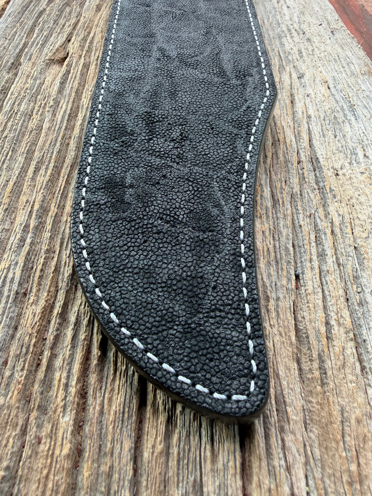 New Randall Model Smithsonian Sheath in Exotic Black Matte Elephant Hide from Treeman with a Black Canteen snap. White thread deviated stitching on black leather..Killer sheath.