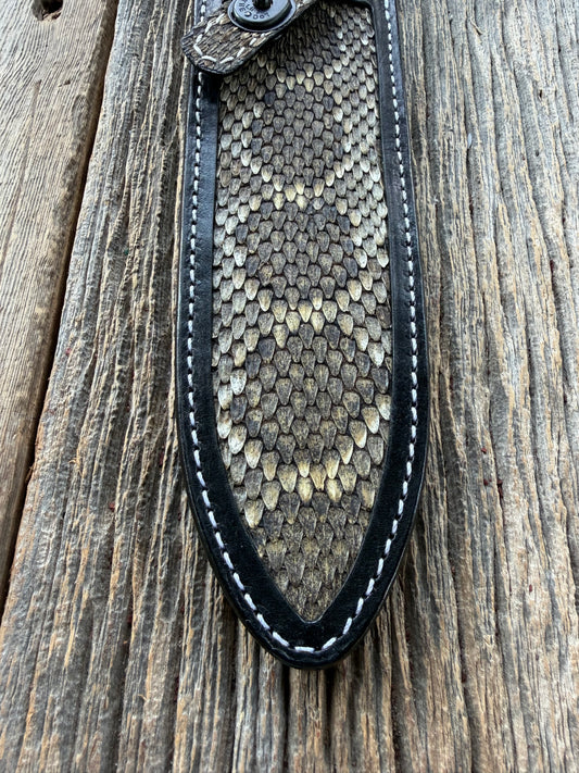 Randall Model Clinton Special sheath with inlayed Western Diamondback RattleSnake skin from Treeman Sheaths. Very dark skin on brown leather, white deviated stitching and black canteen snaps.