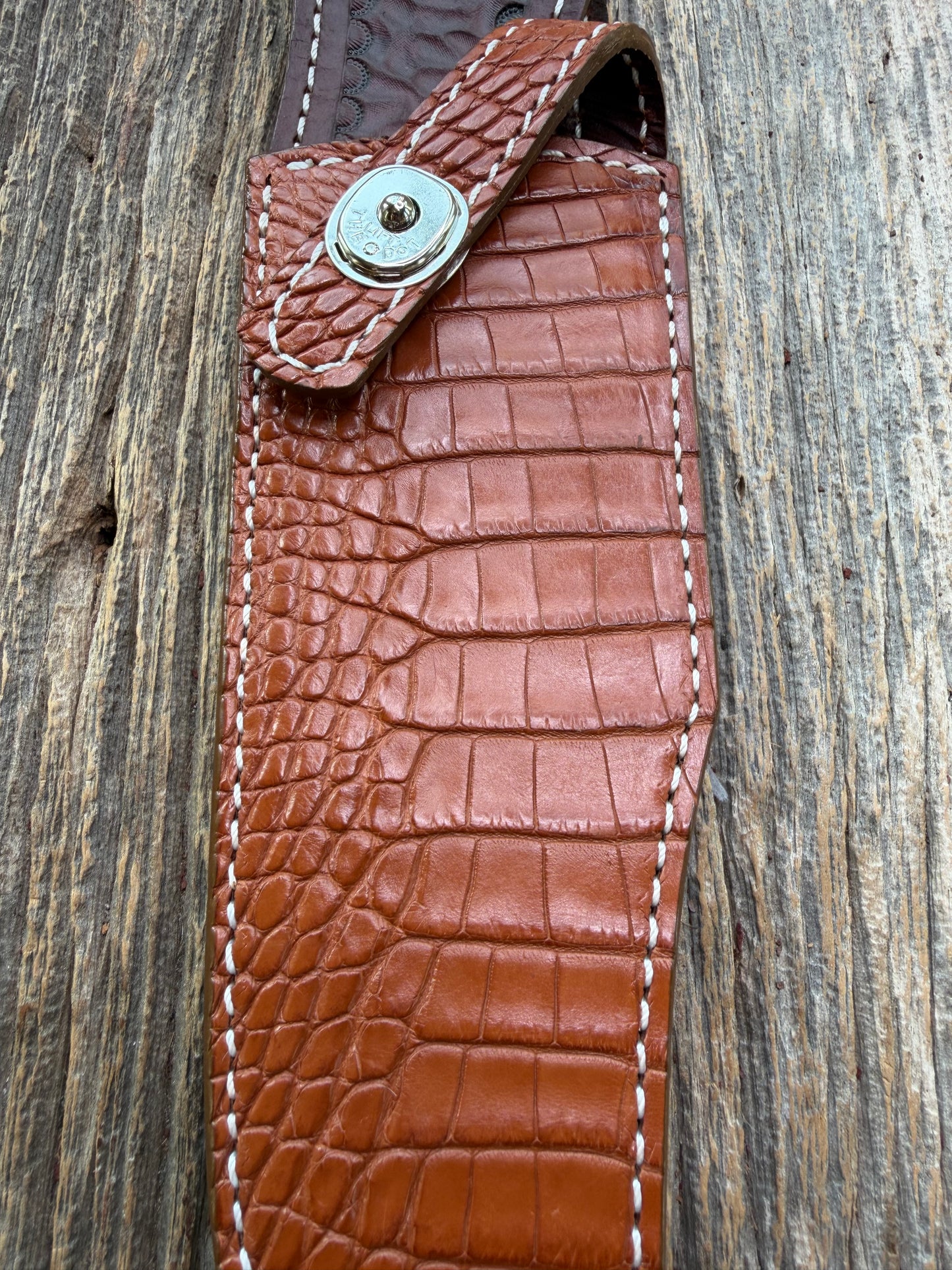 New Randall Model 12-8 Big Bear Sheath in Exotic thick and textured Honey Crocodile skin on brown leather from Treeman with a silver Canteen snap. Hand tooled belt loop. Killer sheath.