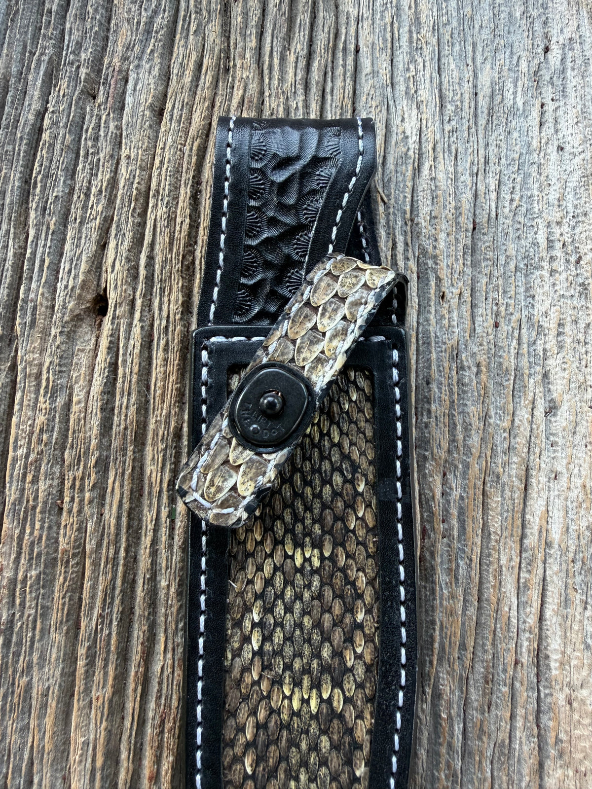 Randall Model 1-6 sheath with inlayed Western Diamondback RattleSnake skin from Treeman Sheaths. Brown leather, white deviated stitching and black canteen snaps.