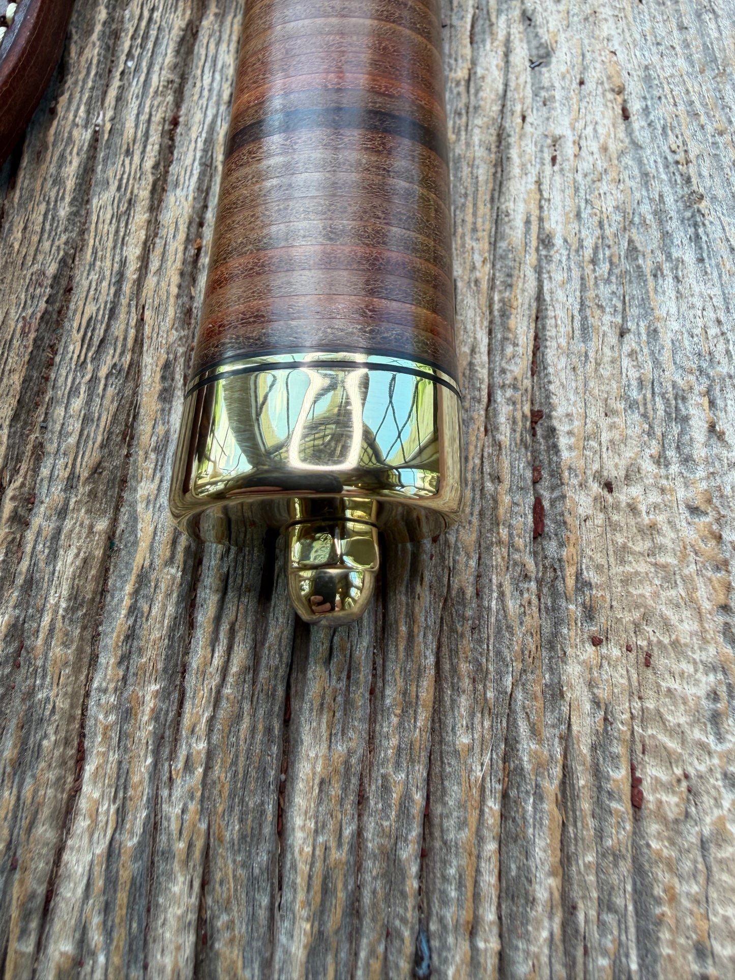 New Randall Model 19-5 Bushmaster with a Leather handle. Carbon blade, Brass single hilt. Brown leather sheath.