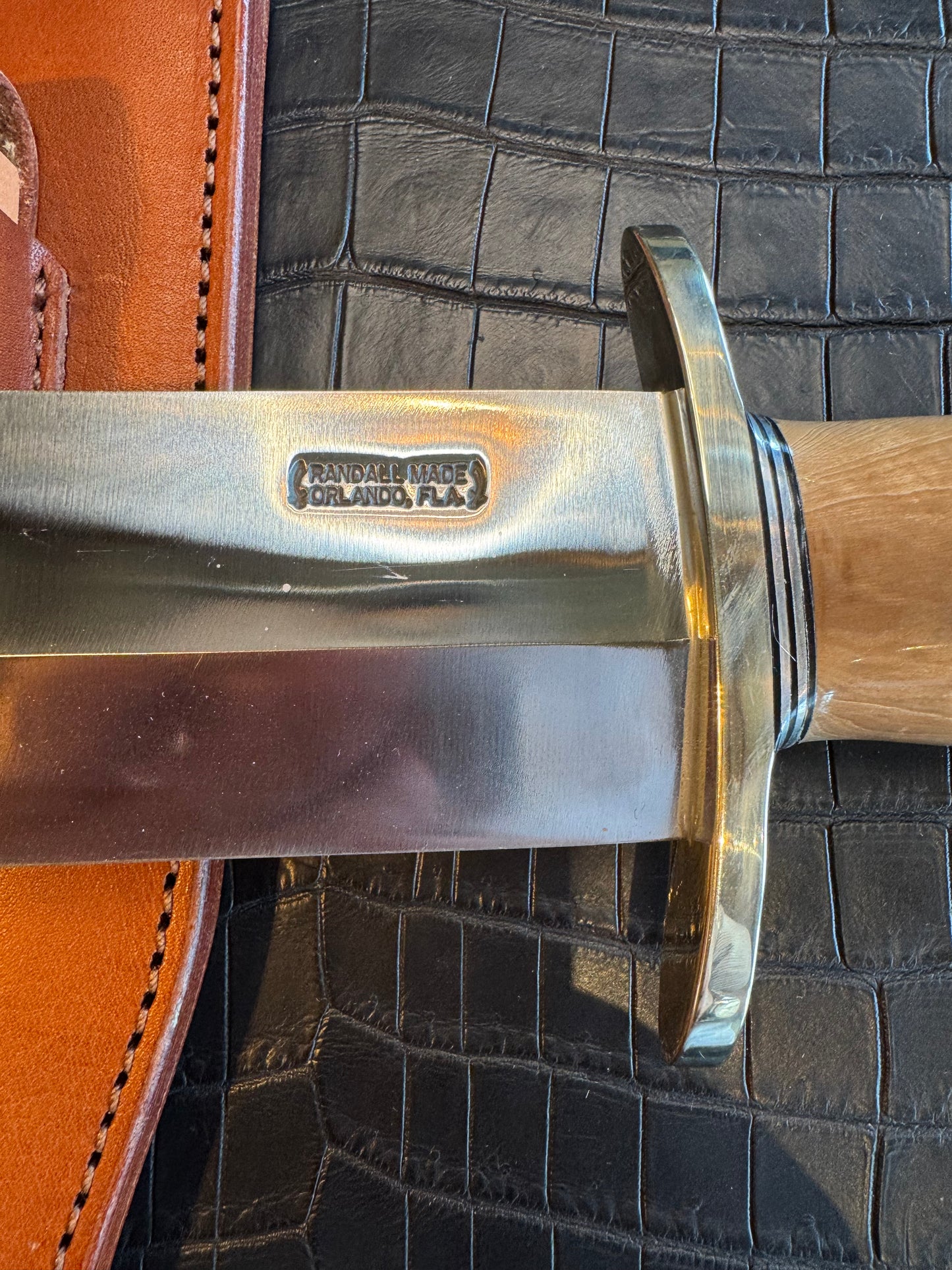 Randall Model 12-11 Smithsonian “Smitty” in a Huge piece of Green and Tan Fossil Walrus Ivory. Nickel Silver Hilt and Butt plate.