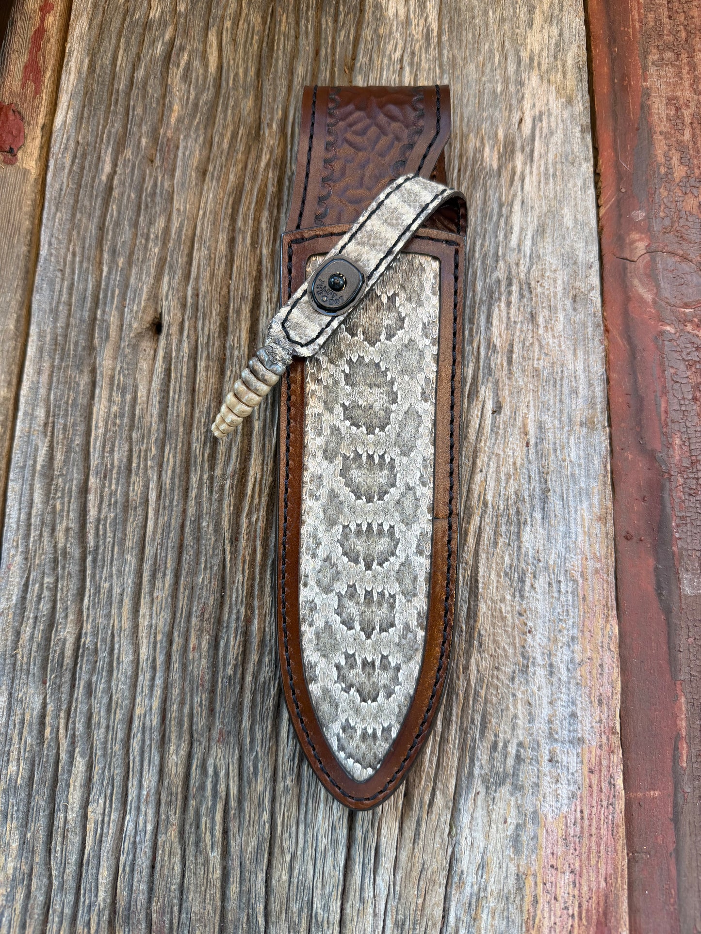 Randall Model Clinton Special with Rattles Sheath in Exotic Prairie RattleSnake from Treeman Sheaths. Tremendous colors on this one.