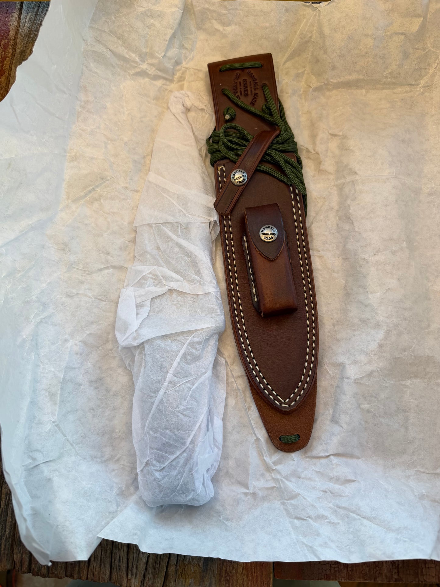 New in Paper Randall Model 14-7.5 in Black Micarta handle, Nickel Silver Hilt, Stainless steel, Sawteeth and Lanyard.