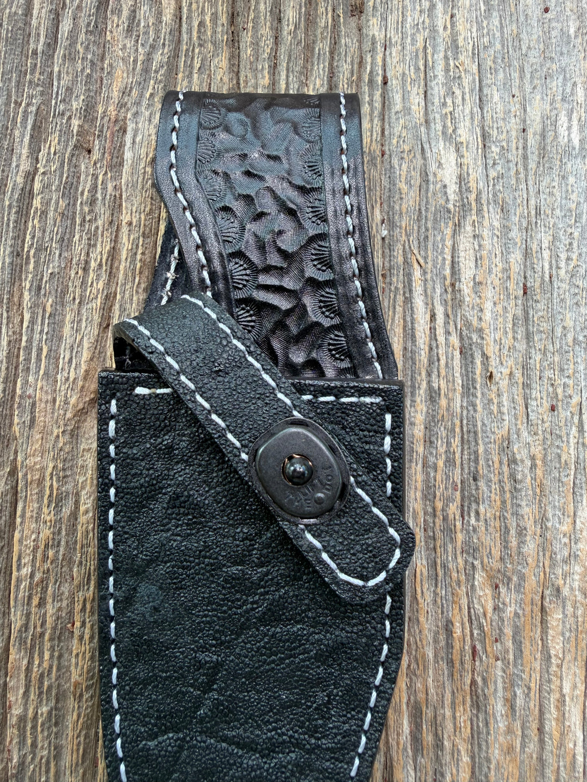 New Randall Model 19-5 Sheath in Exotic Black Matte Elephant Hide from Treeman with a Black Canteen snap. White thread deviated stitching on black leather..Killer sheath.