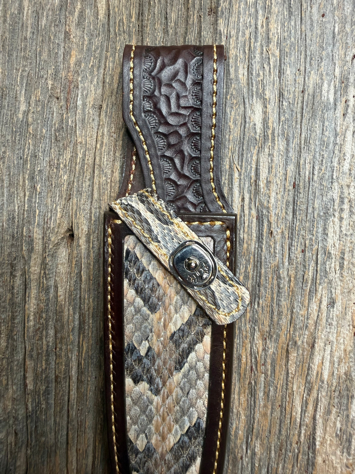 Randall Model 25-6 sheath with a Canebrake RattleSnake skin from Treeman Sheaths. Vibrant colors and along side Copperheads the hardest skin to source.