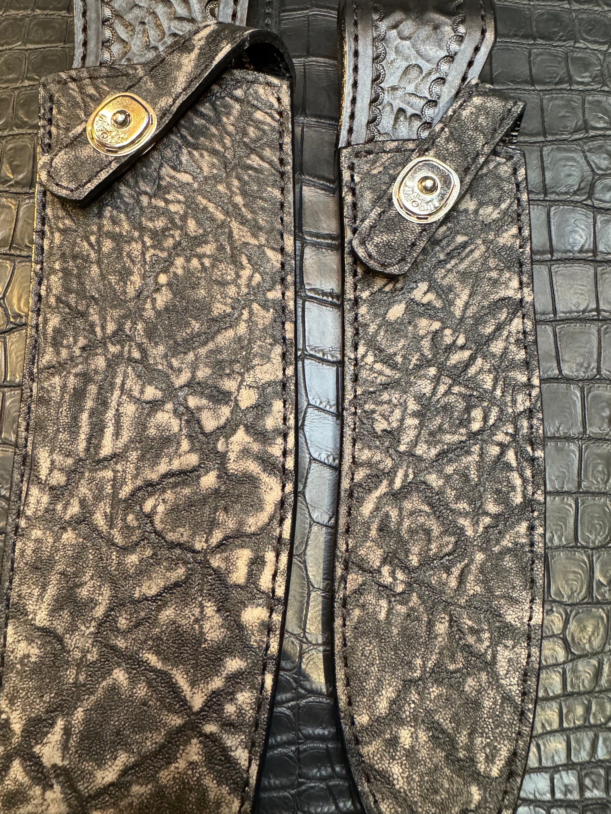 A pair of Randall Model 12-11 Large Sasquatch and Randall Model 12-8 Small Sasquatch Sheaths in Exotic Black Elephant by Treeman.