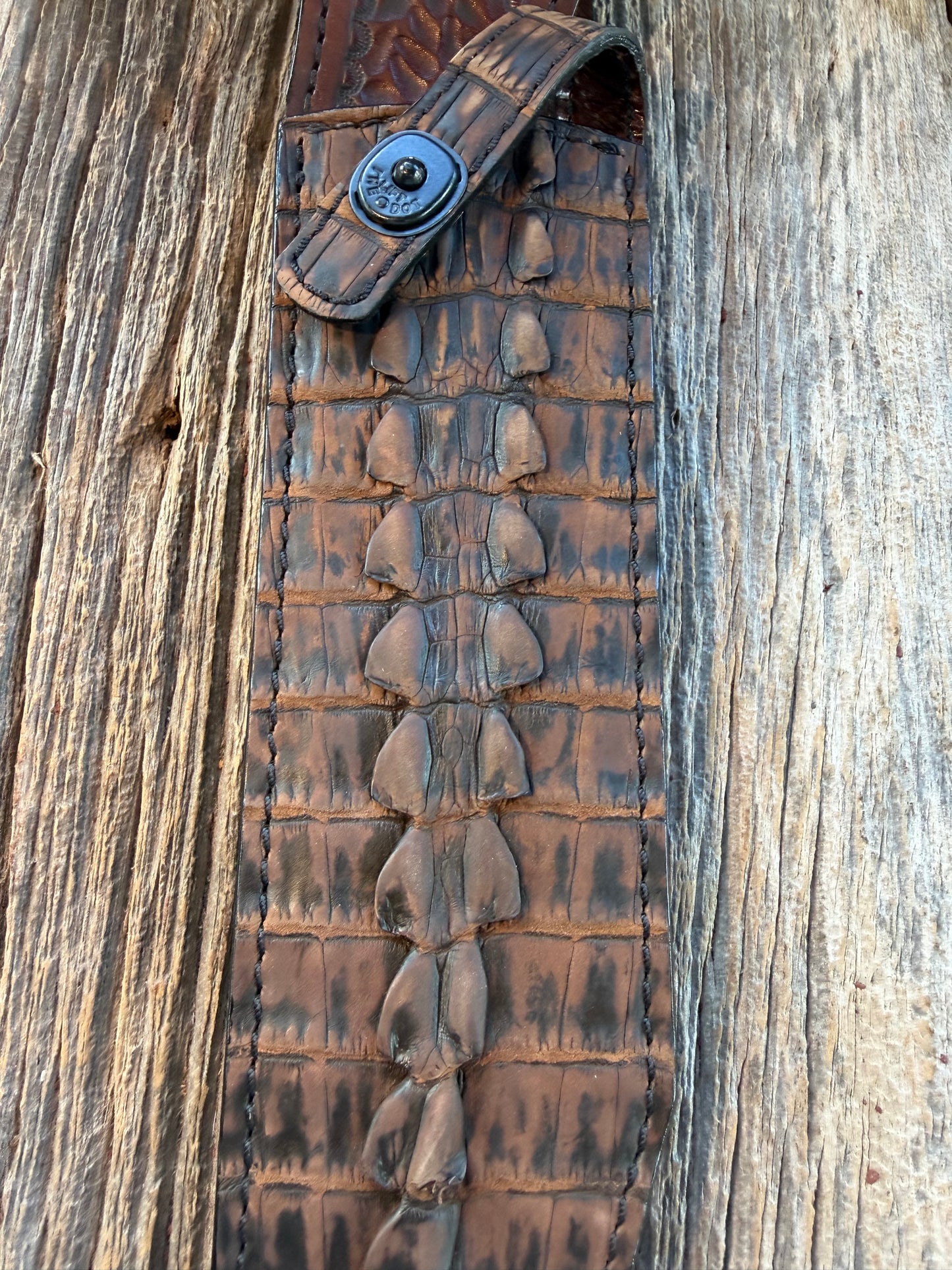 New Randall Model Confederate Sheath in Exotic Dark Brown Sueded Crocodile Tail from Treeman with the newest Black Canteen snap.