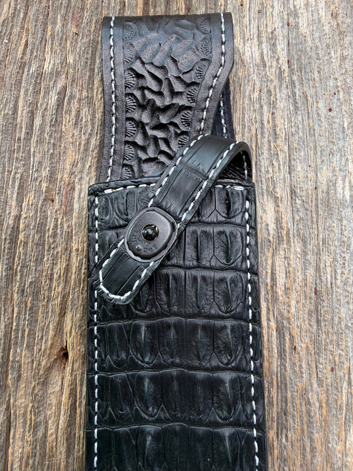 New Randall Model 12-9 Sheath in Exotic Black Matte Crocodile tail from Treeman with a Black Canteen snap. White thread deviated stitching on black leather..Killer sheath.