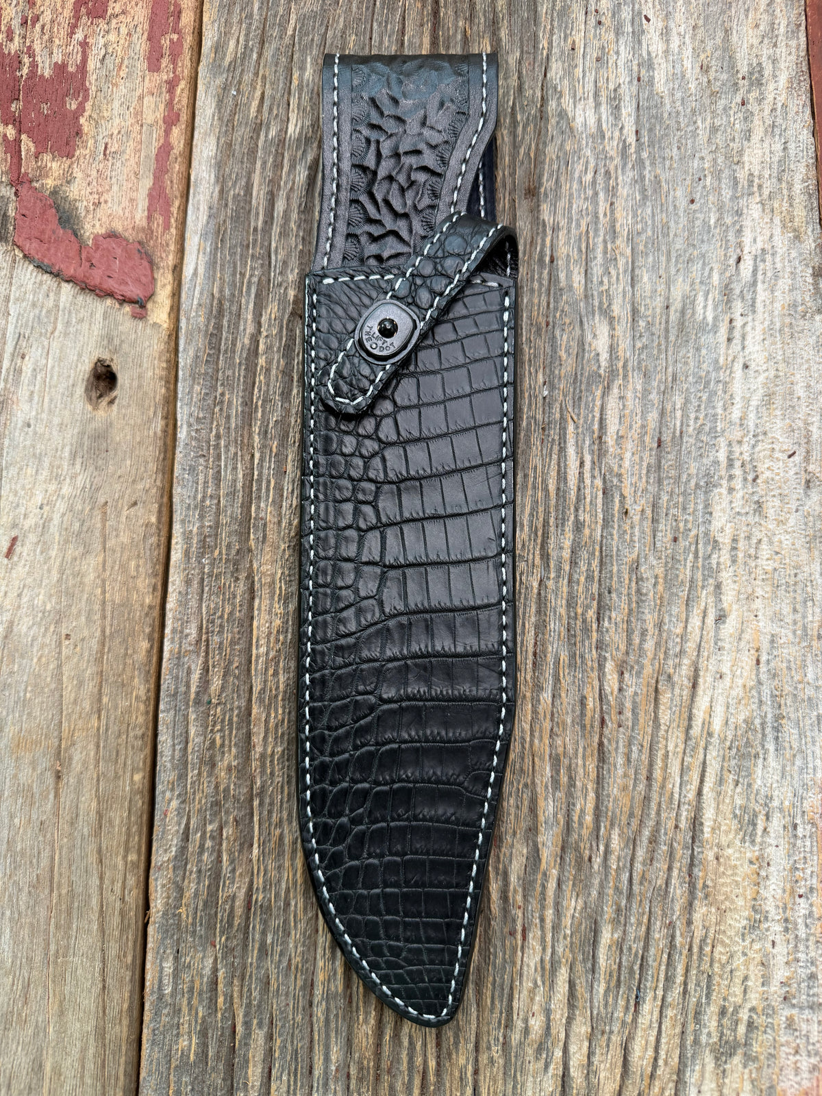 New Randall Model 12-9 Sheath in Exotic Black Matte Crocodile from Treeman with a Black Canteen snap. White thread deviated stitching on black leather..Killer sheath.