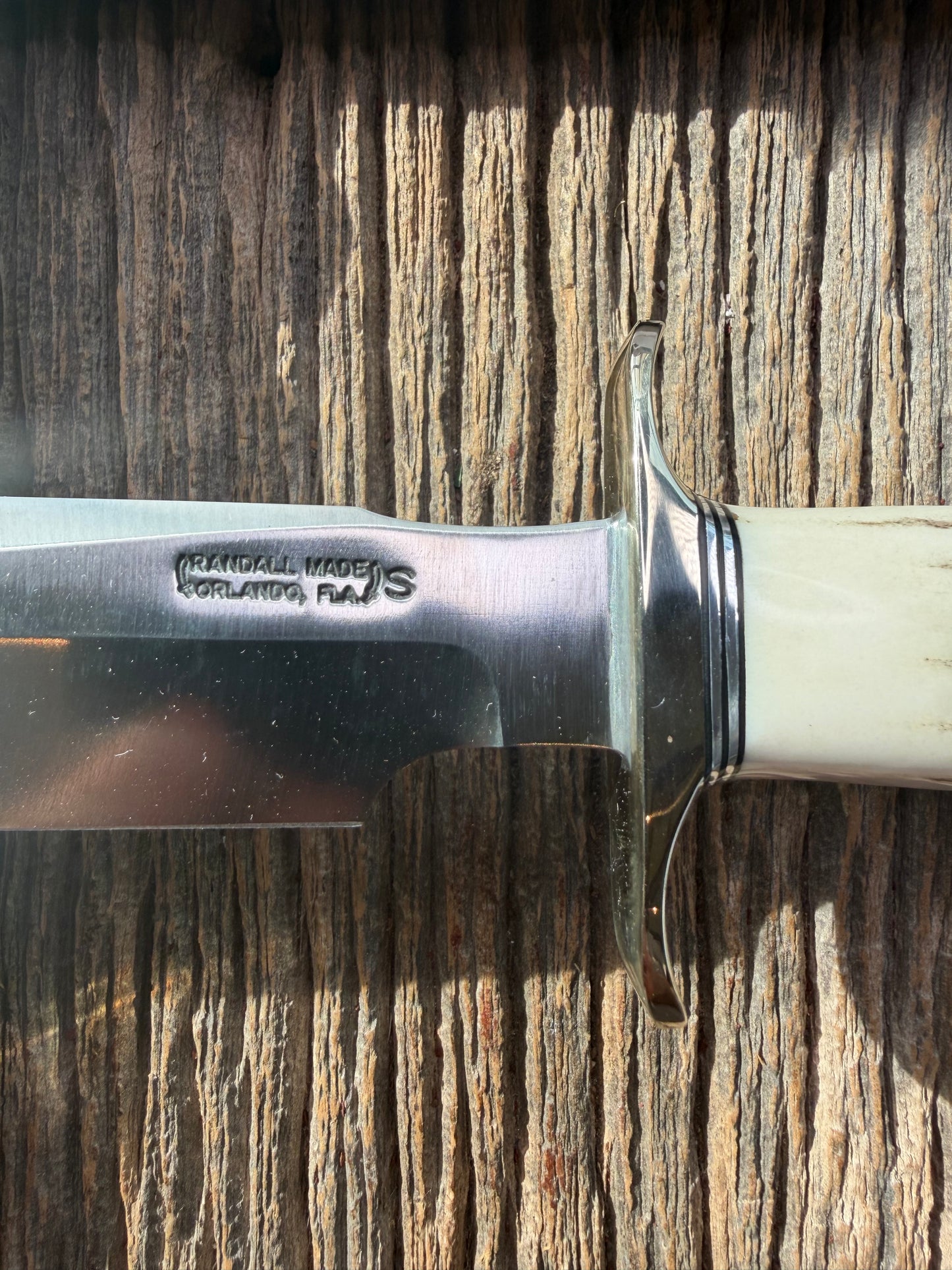 New in Paper Randall Made Knife Model 1-7 Stag , Stainless, Black and Aluminum spacers, Nickel Silver Hilt, Aluminum butt cap.