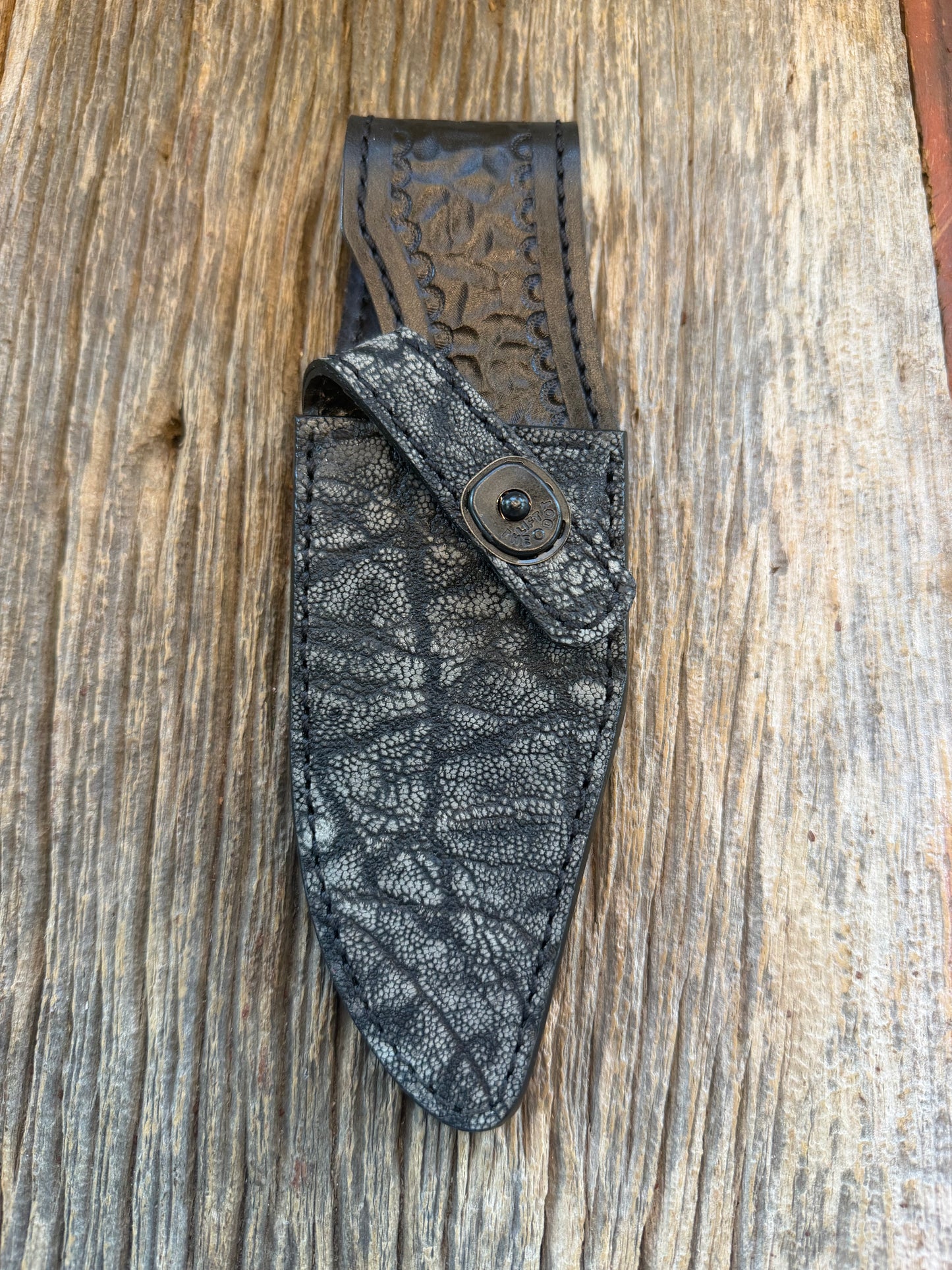 Randall Model 19-5 Sheath in Exotic African Elephant Ear from Treeman Sheaths. Black and Grey pebble texture and the new black Canteen snap, phenomenal.