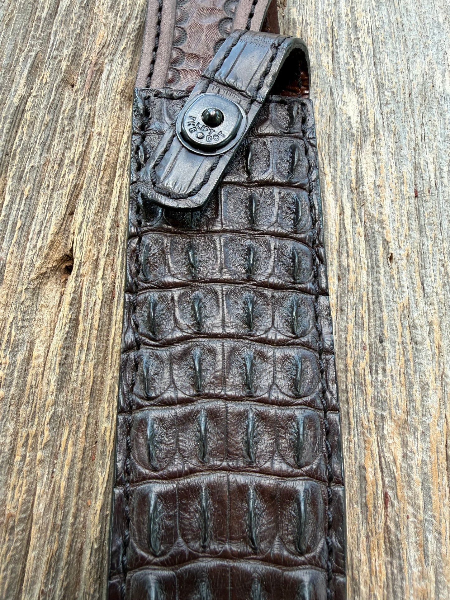 New Randall Model 1-8 Sheath in Exotic Dark Brown Matte Hornback Crocodile from Treeman with the newest Black Canteen snap. Killer sheath.