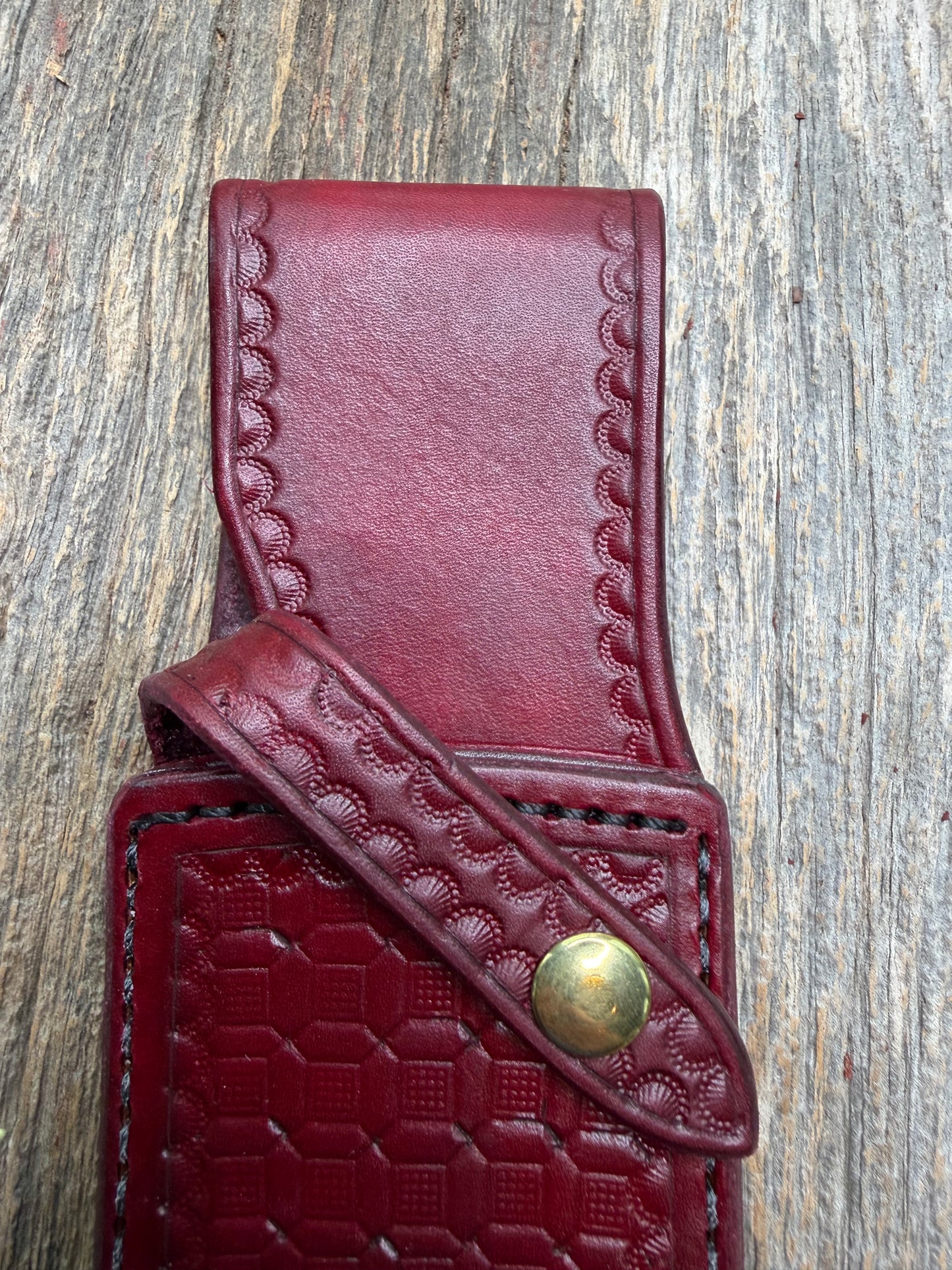 Randall Model 12-8 “Big Bear” sheath in Ox Blood Red stamped leather from Sullivans by Gutcher. Parquet window pattern, mesmerizing !!