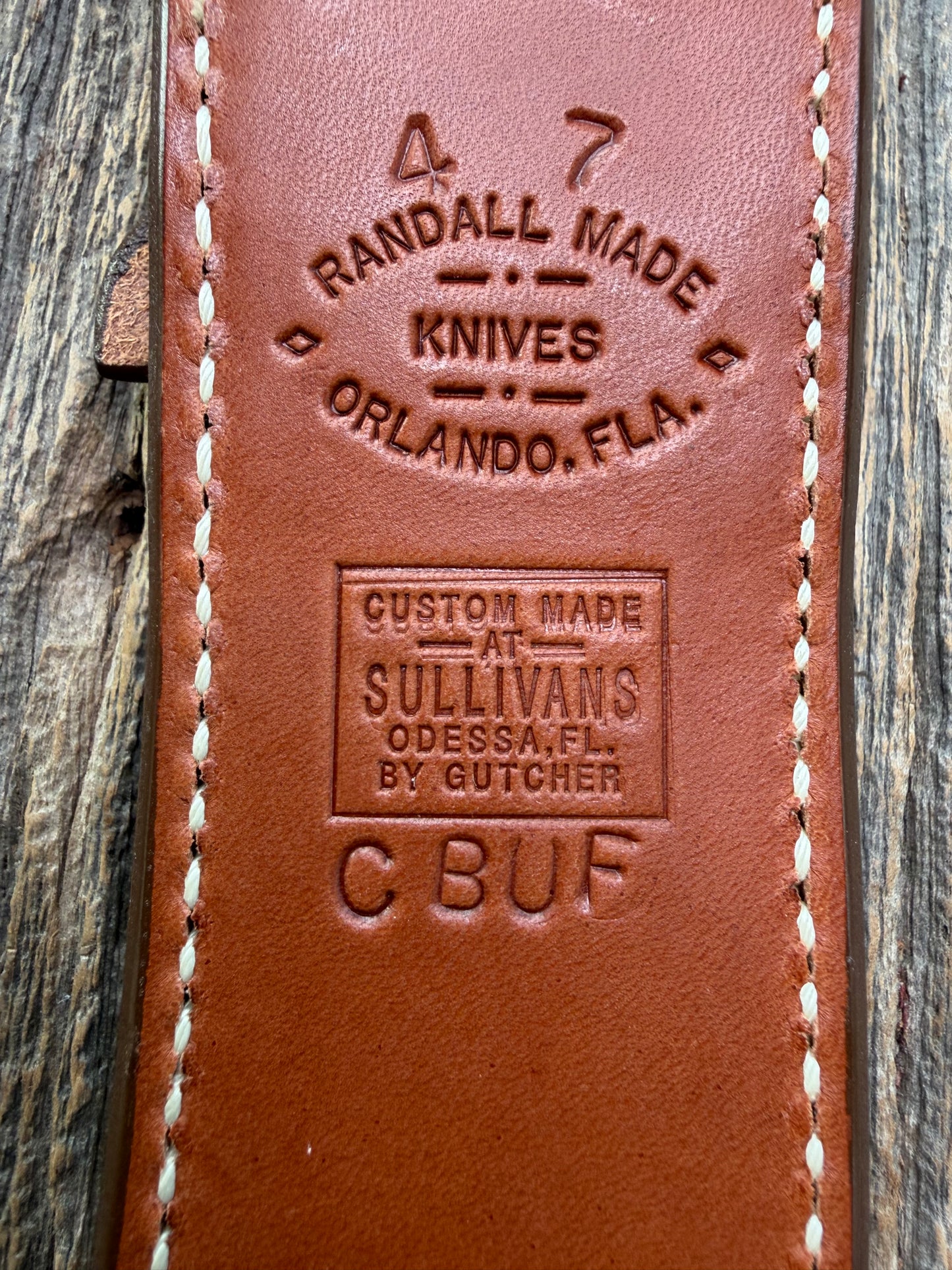Pristine Randall Model 4-7 sheath in Exotic Cape Buffalo leather from Sullivans by Gutcher. Heavily tooled belt loop and strap. Randall snap and clean stamping on the back … perfect!!