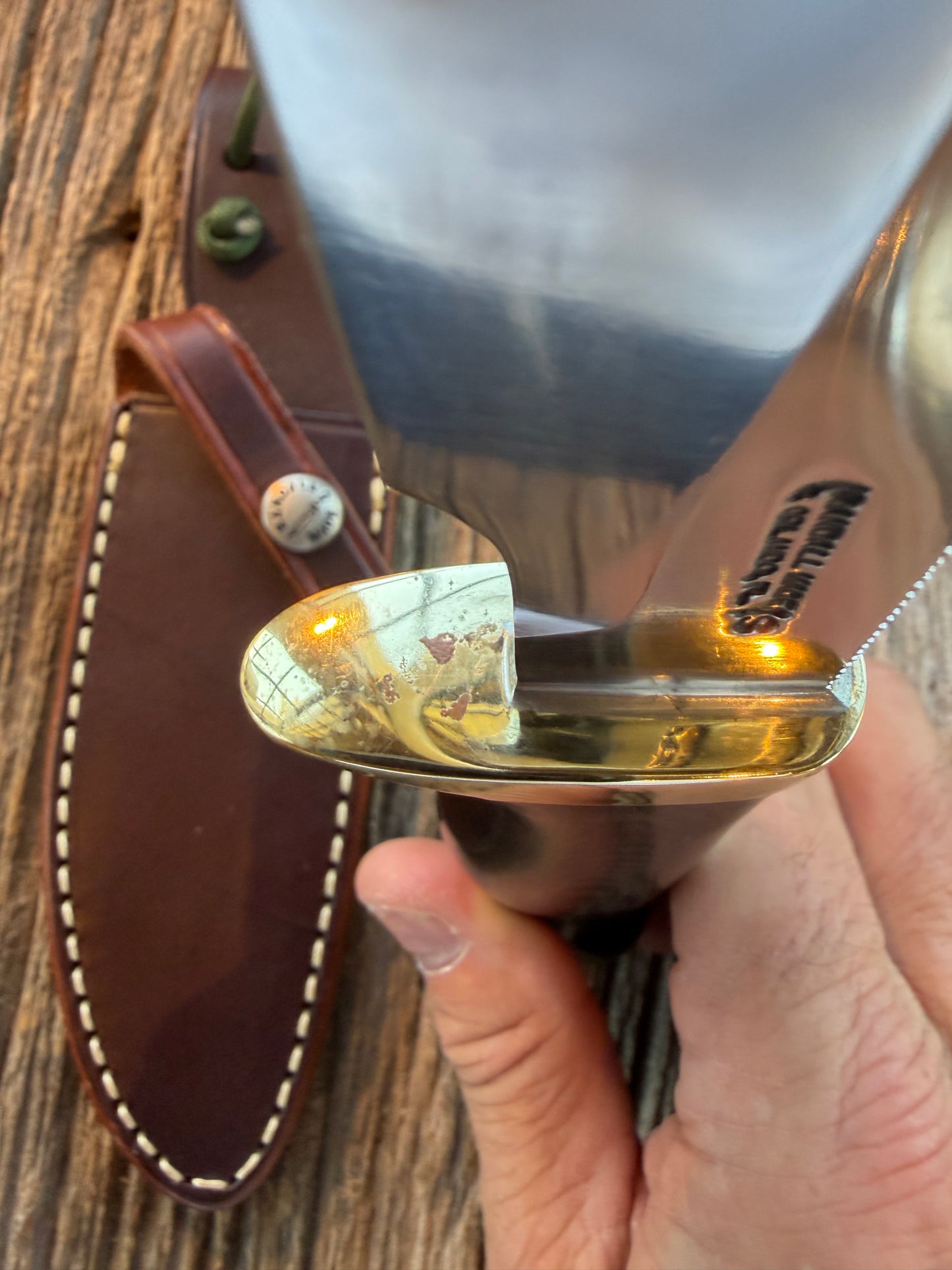 Nice Randall Model 28 Woodsman in Black Micarta. SS blade, brass single hilt. Lanyard. Brown leather sheath.