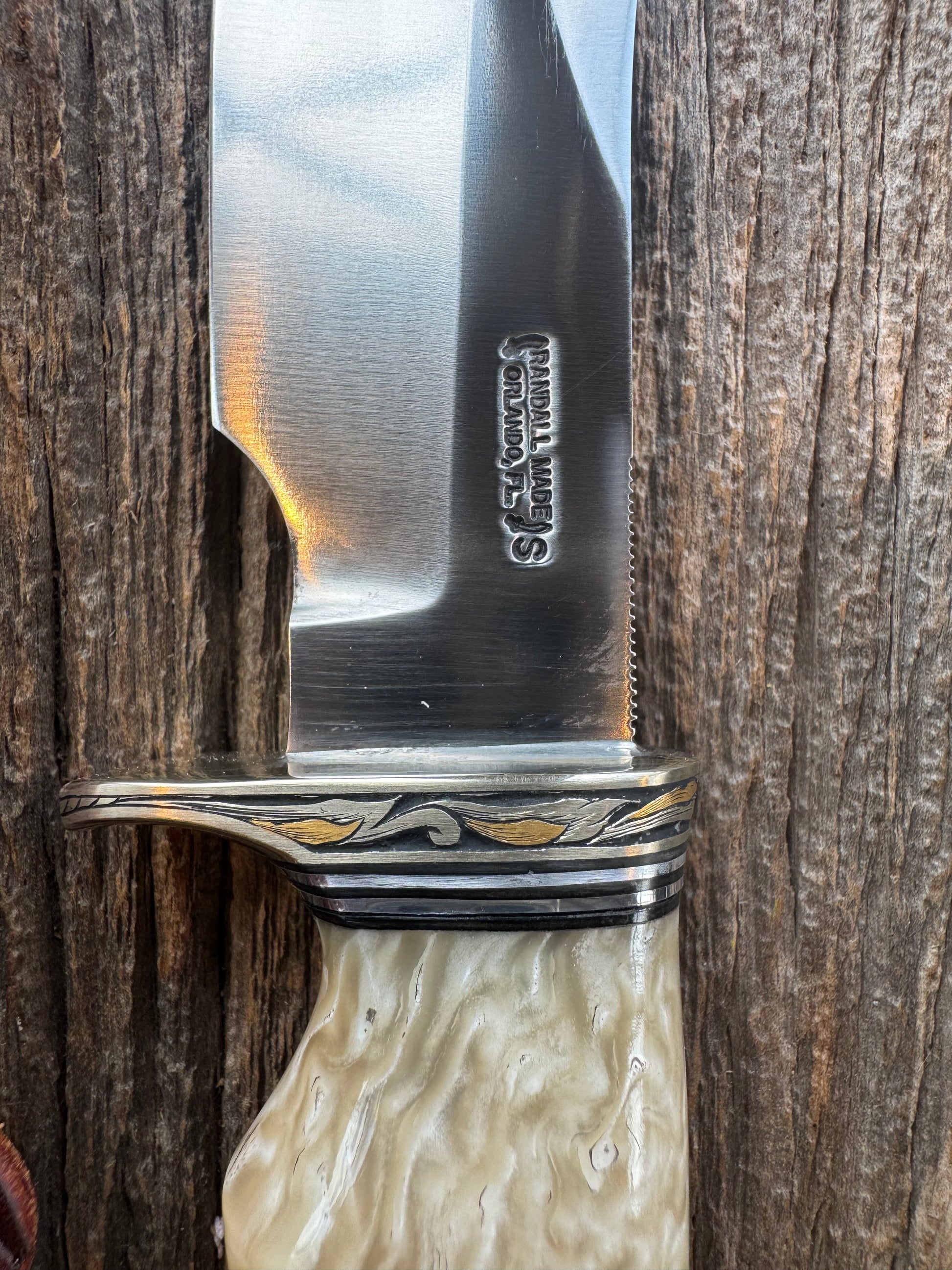Randall Model Bowles Skinner Dealer Special Knife, perfect Musk Ox. This knife is a one of 4 per Rick Bowles. Beautifully engraved by Jere Davidson and adorned with gold and silver inlays.