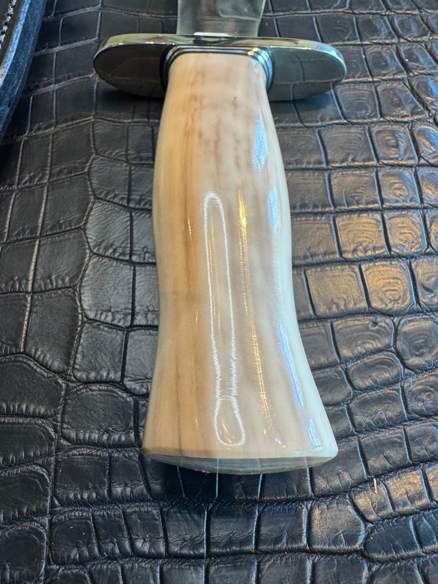 Randall Model 12-8 Big Bear in a gorgeous piece of Creamy Fossil Walrus Ivory. Nickel Silver Hilt and a natural exposed end.