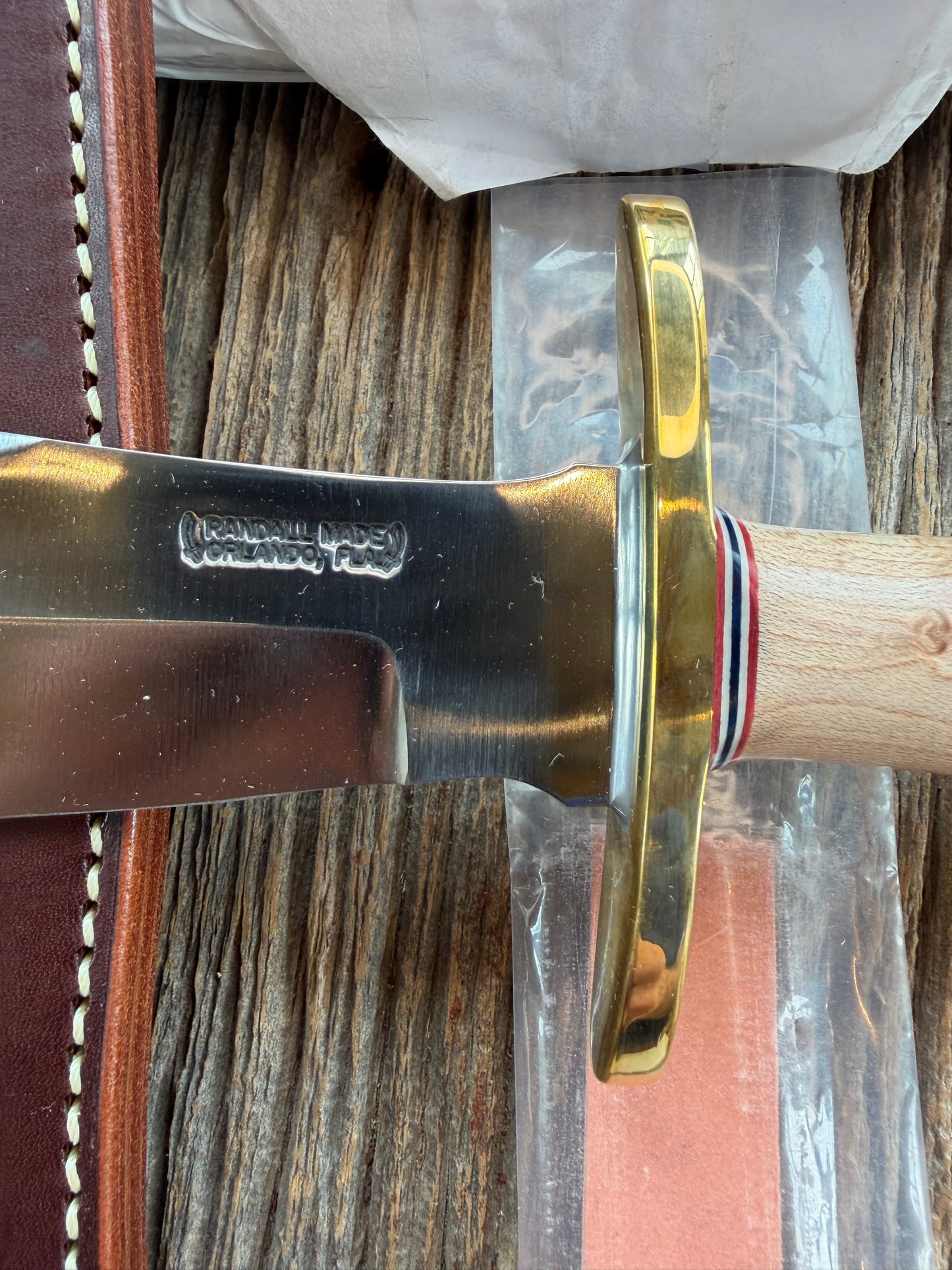 New Paper Randall Made Knife Model 12-8 supplied Maple handle, carbon  blade, brass hilt and rounded butt cap. Red white and blue spacers