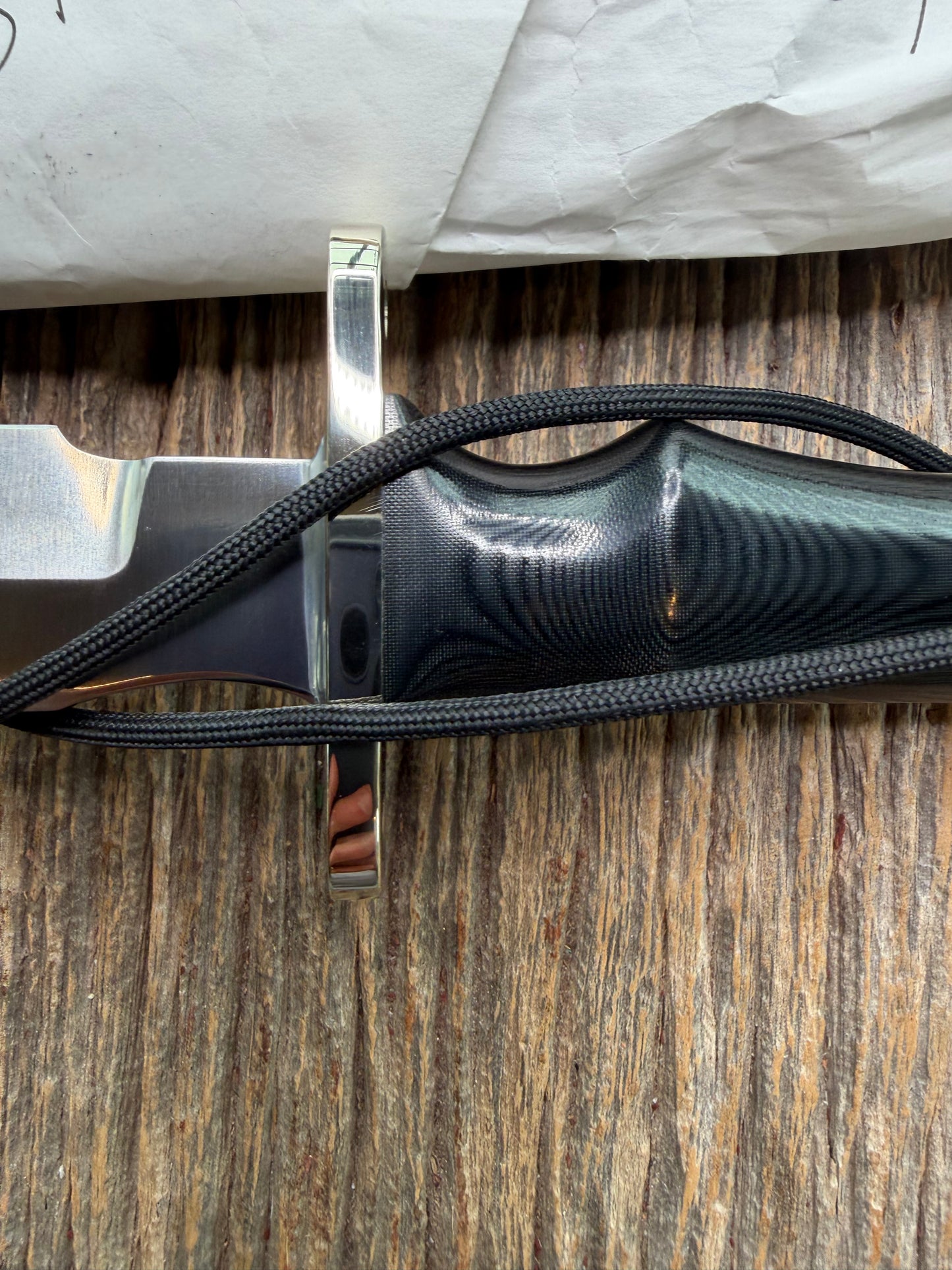 New in Paper Randall Model 16 SP#1 Special fighter with a Black Micarta handle. SS blade, Nickel silver Double hilt. Lanyard. Brown leather sheath.