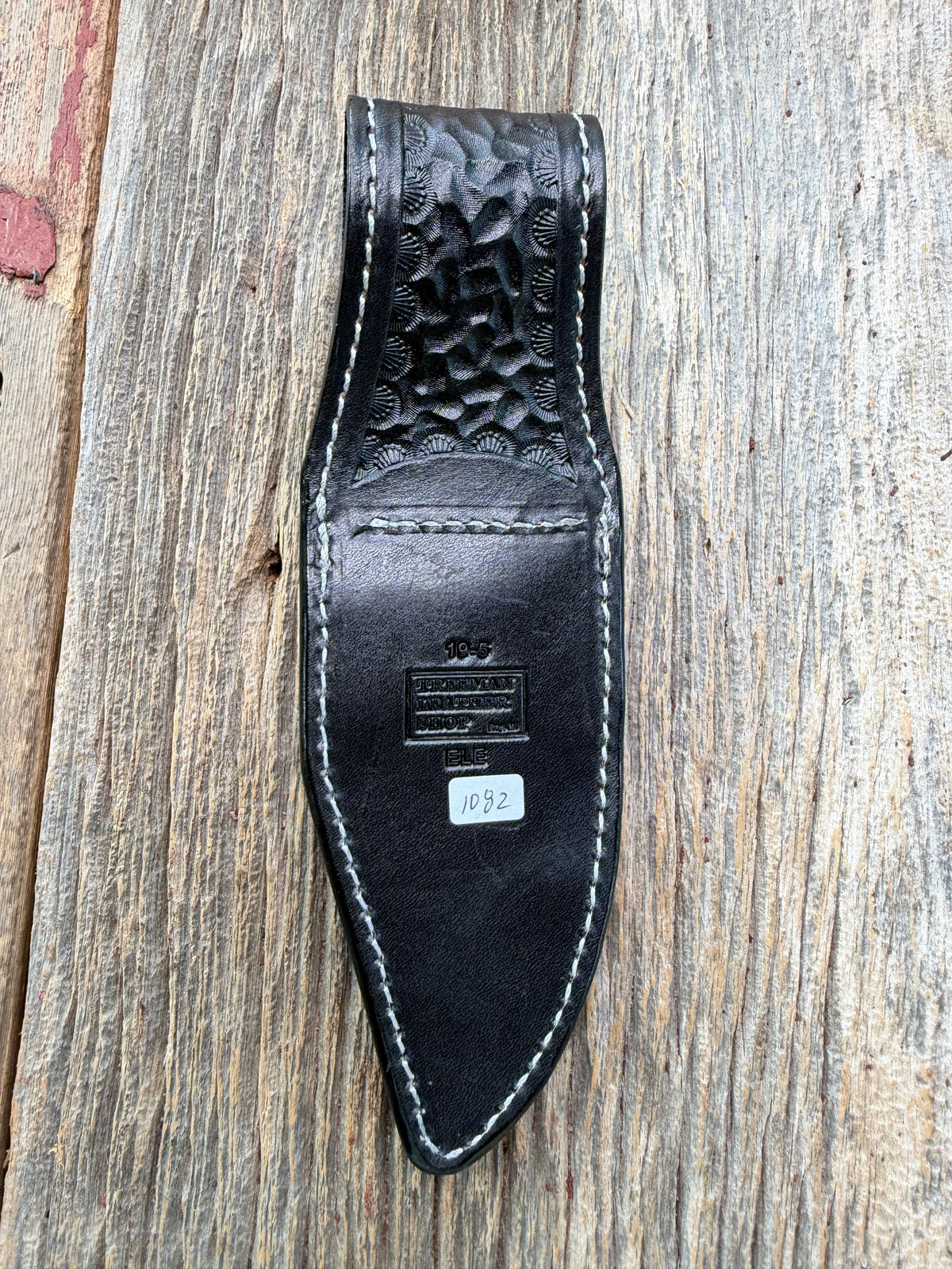 New Randall Model 19-5 Sheath in Exotic Black Matte Elephant Hide from Treeman with a Black Canteen snap. White thread deviated stitching on black leather..Killer sheath.