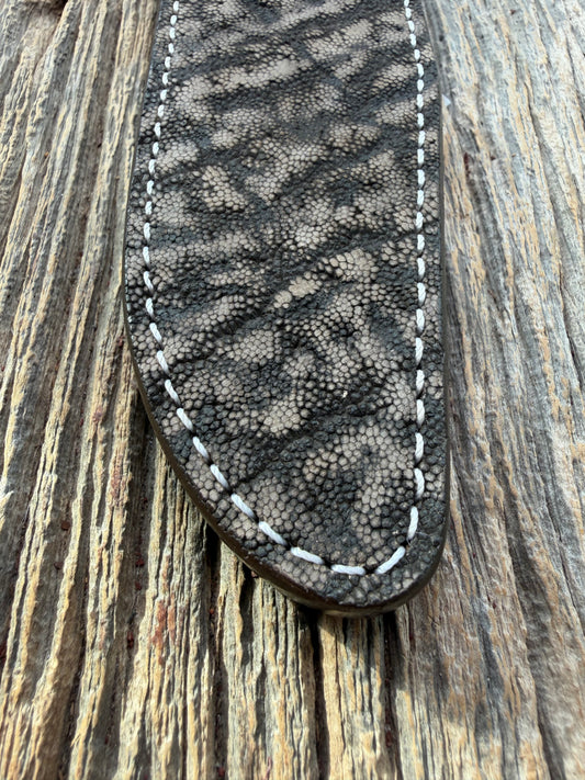 New Randall Model 1-8 Sheath in Exotic thick and textured Black and Grey Elephant Ear  on brown leather from Treeman with a silver Canteen snap. Hand tooled belt loop. Killer sheath.