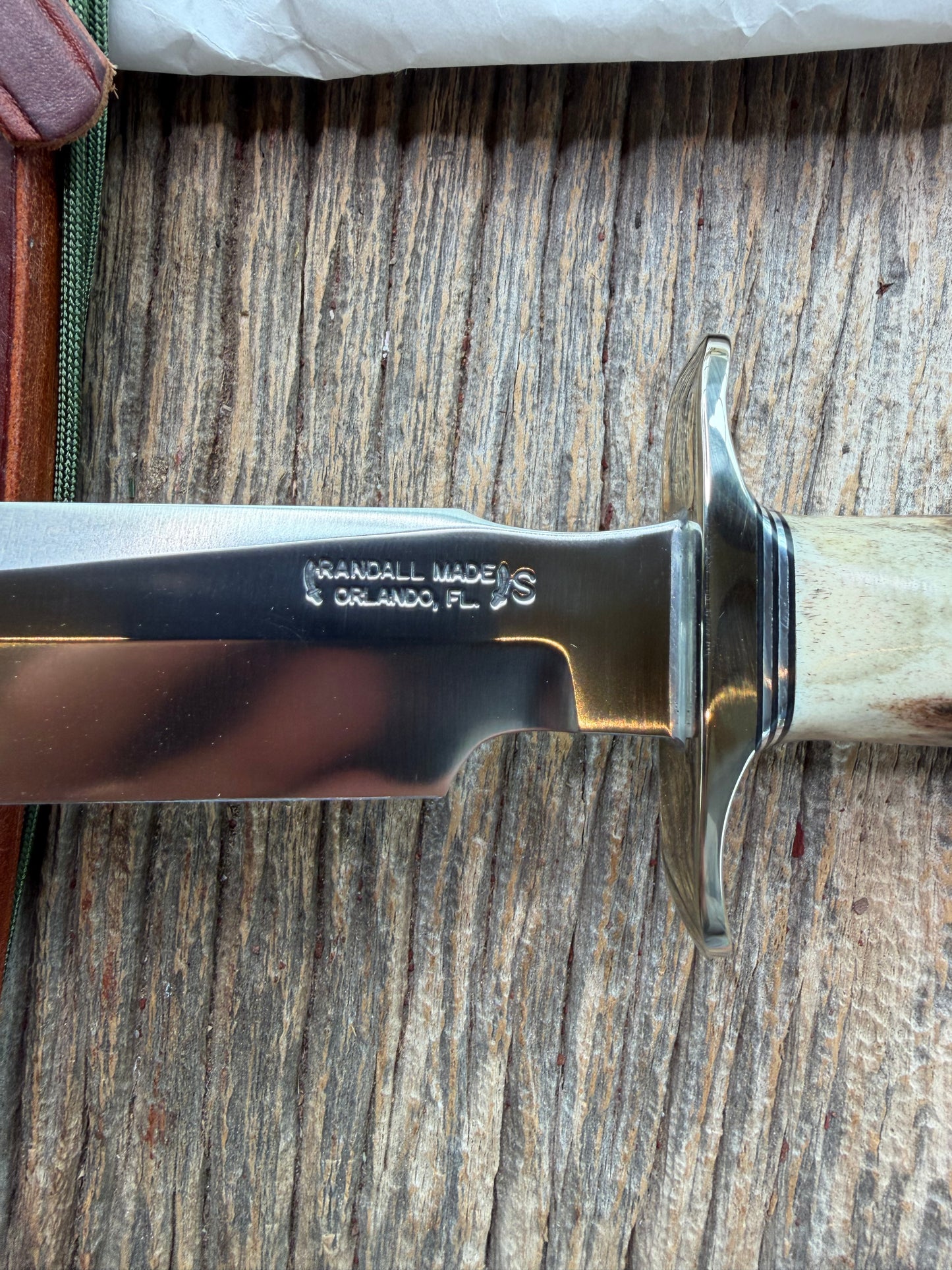 New in Paper Randall Made Knife Model 1-7 Darkened Stag , Stainless, Black and Aluminum spacers, Nickel Silver Hilt, Aluminum butt cap.