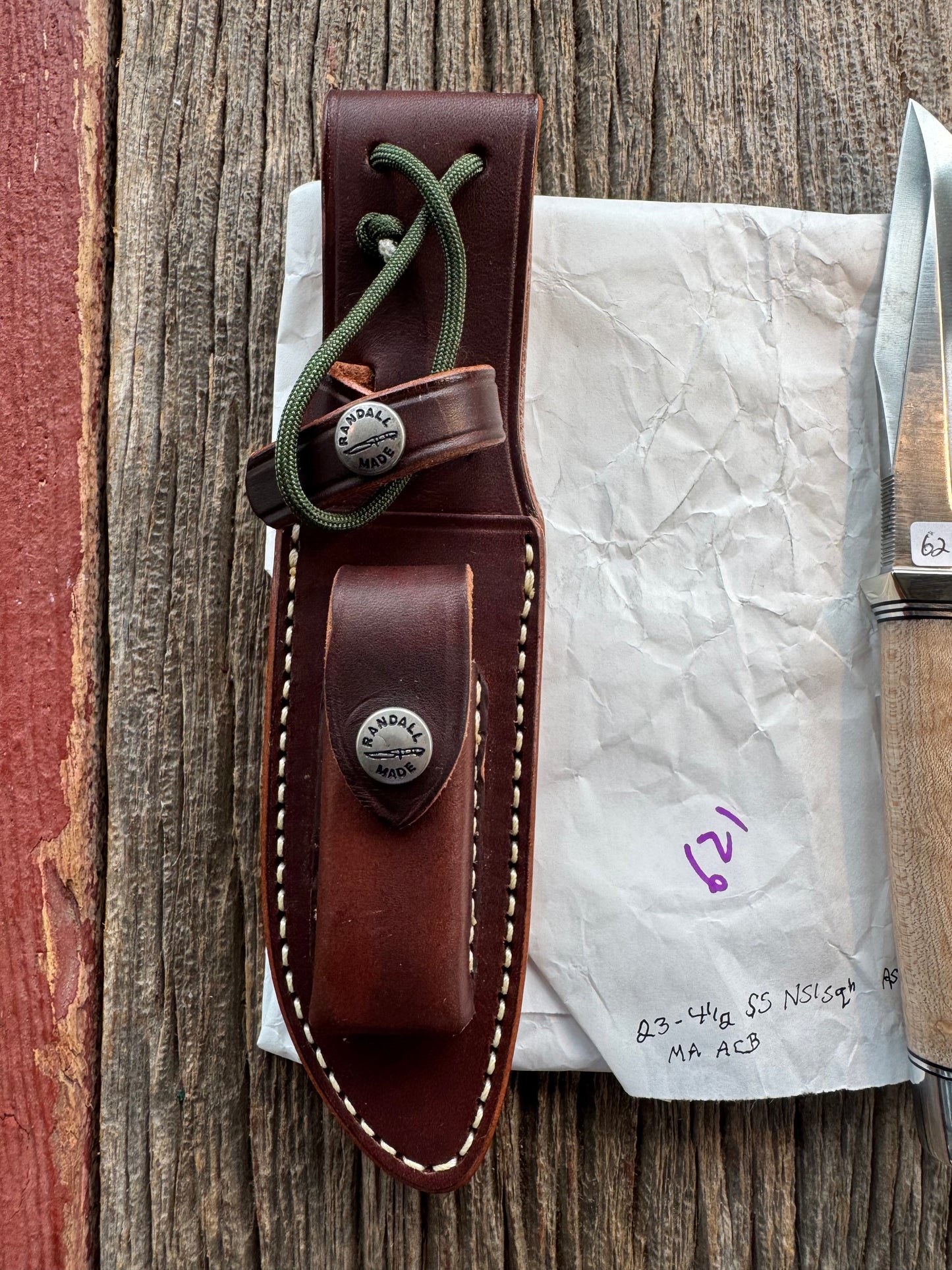 New in Paper Randall Model 23 Game Master Stainless steel blade, Nickel silver hilt and aluminum butt cap. Brown leather sheath. Maple wood handle.
