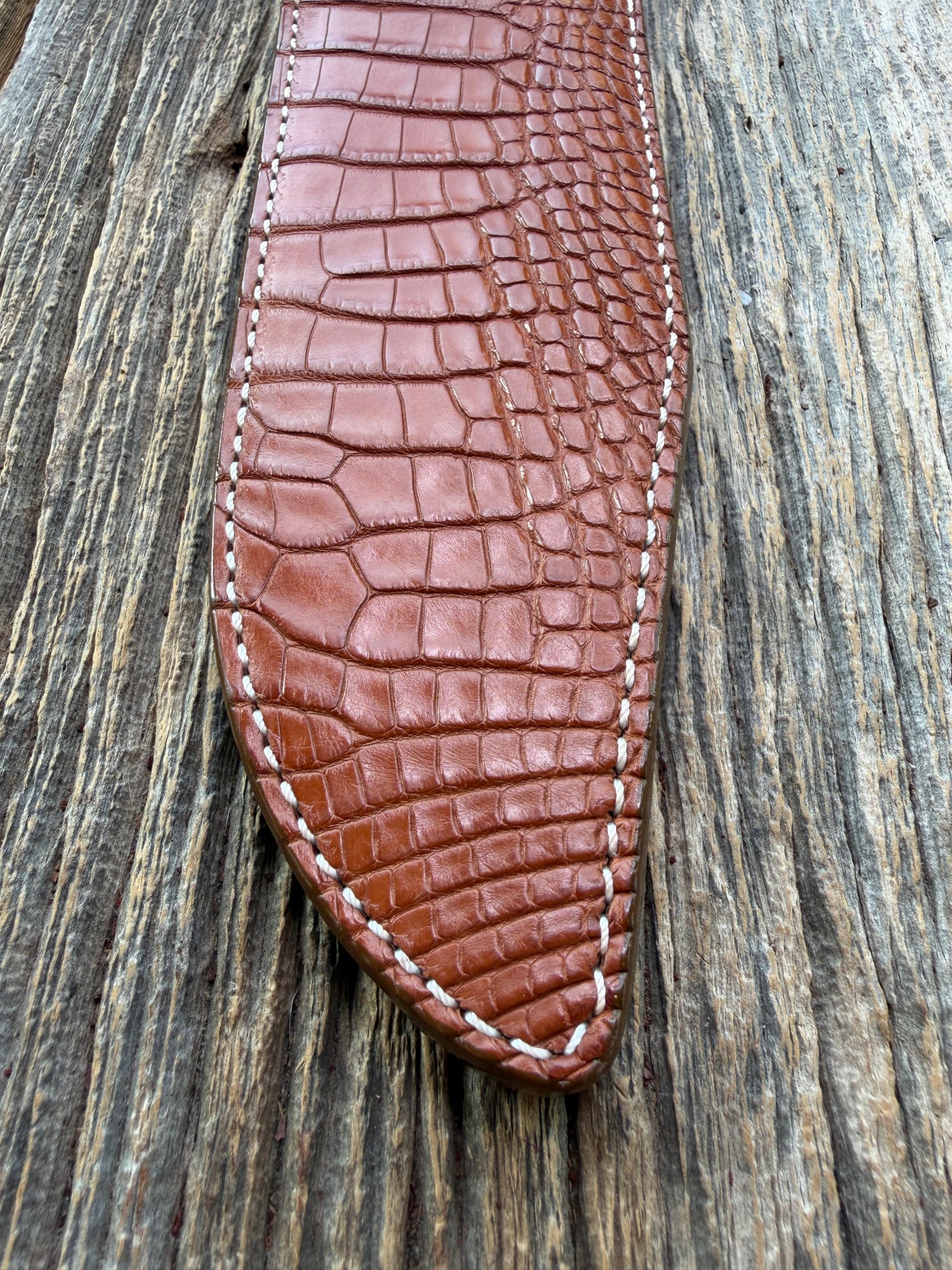 New Randall Model 12-9/14 Grind Sheath in Exotic thick and textured Honey Crocodile skin on brown leather from Treeman with a silver Canteen snap. Hand tooled belt loop. Killer sheath.