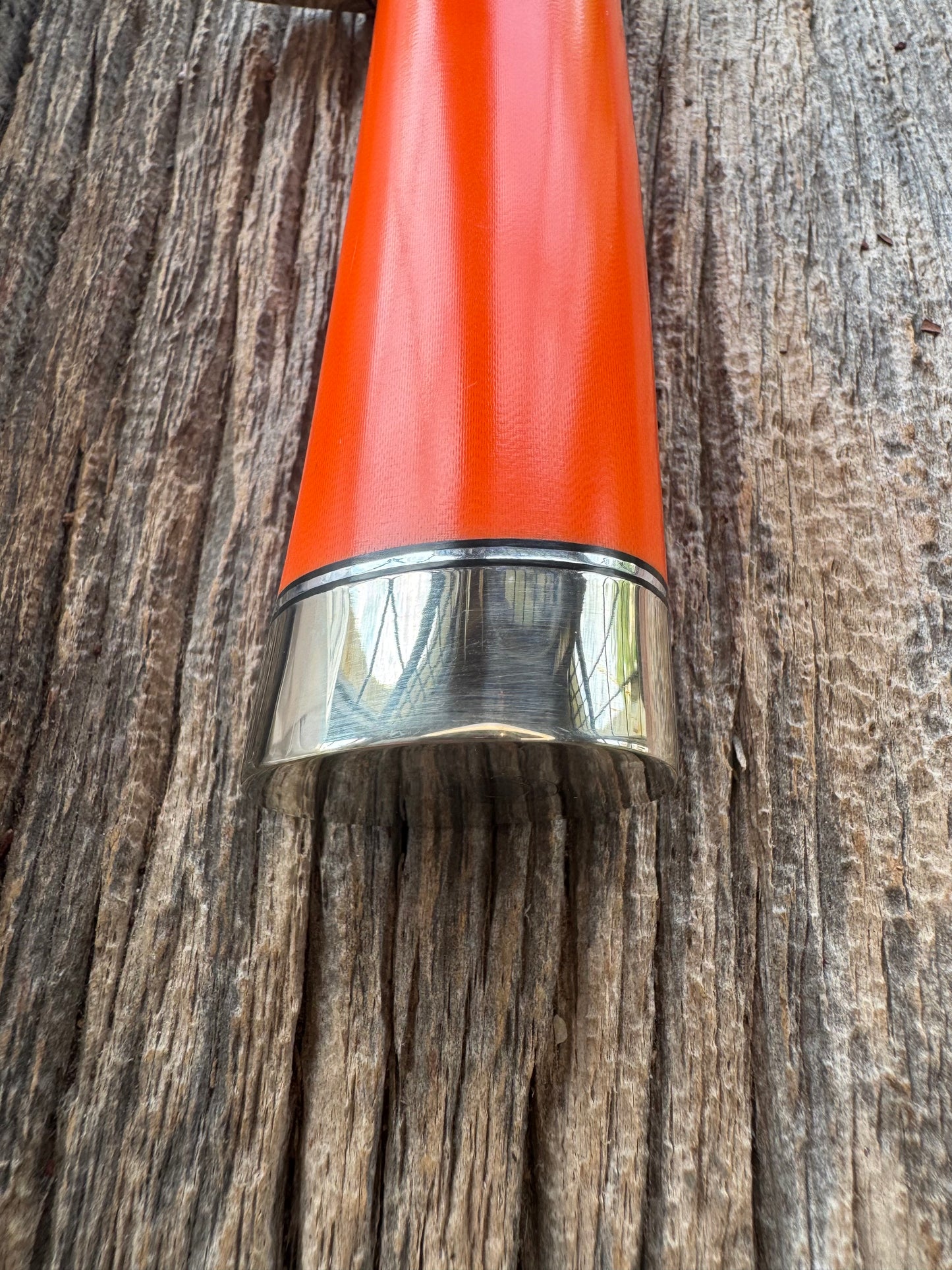 New in paper Randall Model 19-5 with a nice piece of customer supplied Orange G10. Stainless Steel, Nickel Silver Hilt and Butt cap.