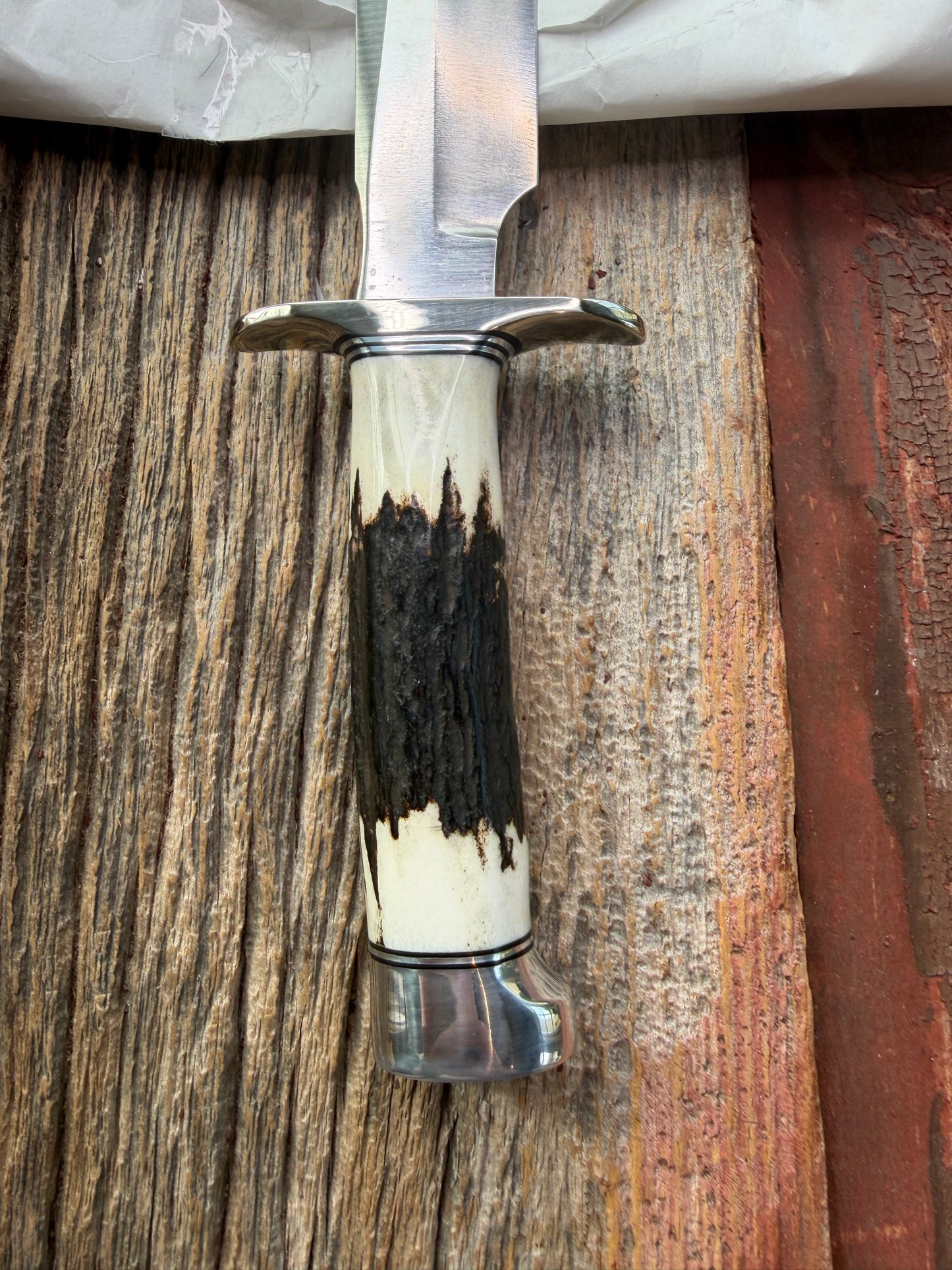 New in Paper Randall Made Knife Model 1-7 Stag , Stainless, Black and Aluminum spacers, Nickel Silver Hilt, Aluminum crows beak butt cap.